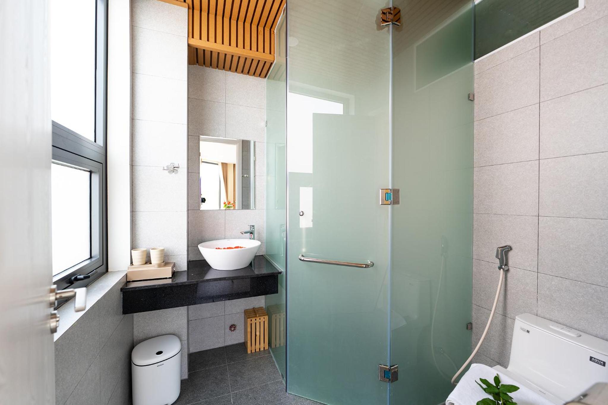Deluxe Triple Room - Photo 14