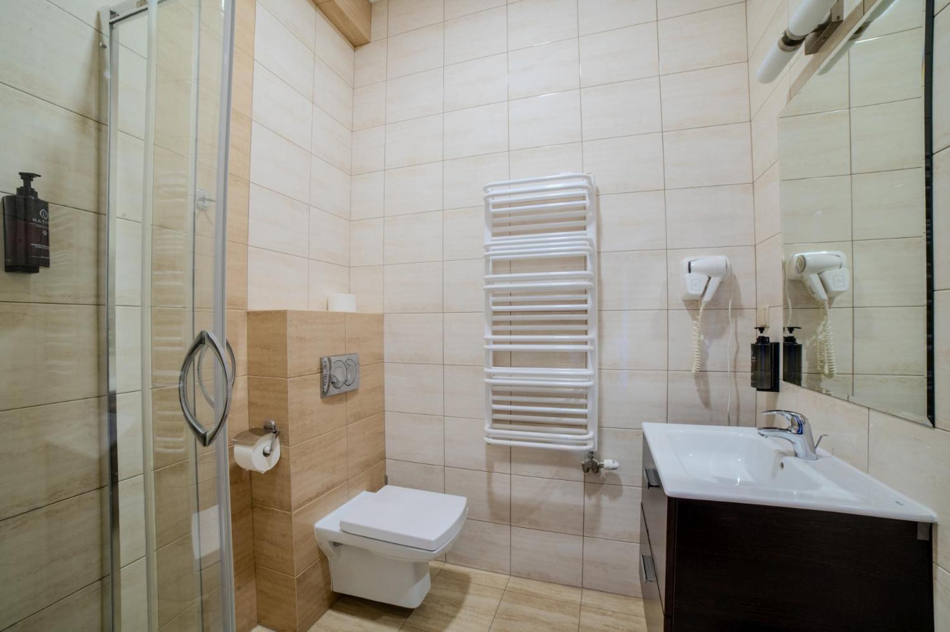 Double Room (2 Adults + 1 Child) photo 2