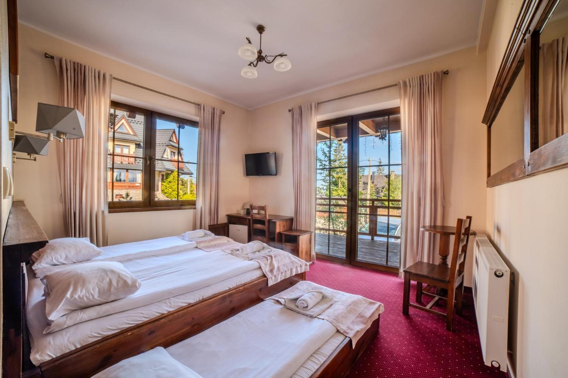Double Room (2 Adults + 1 Child) photo 1