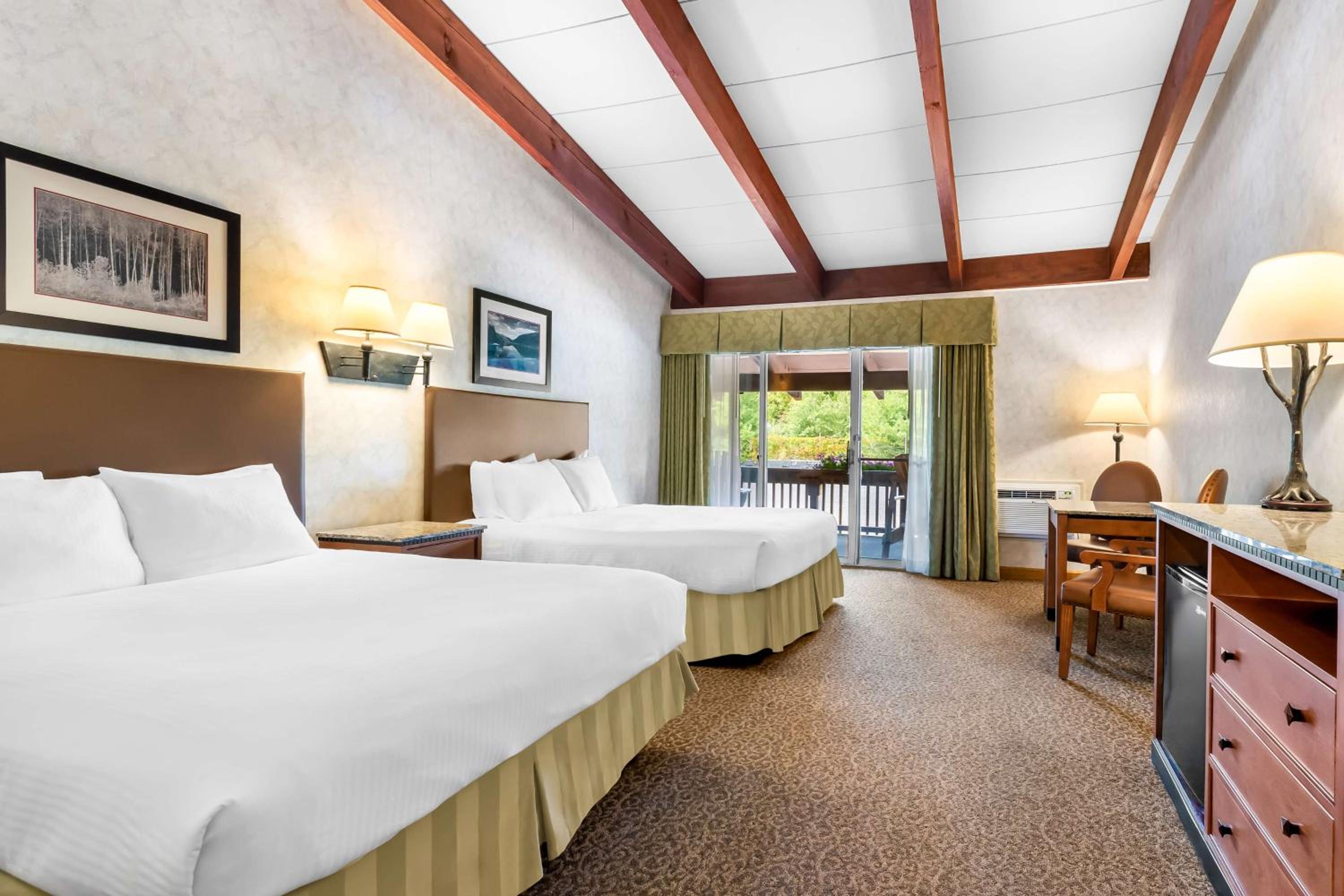 Queen Room with Two Queen Beds and Balcony - Non-Smoking/Second Floor - Photo 1