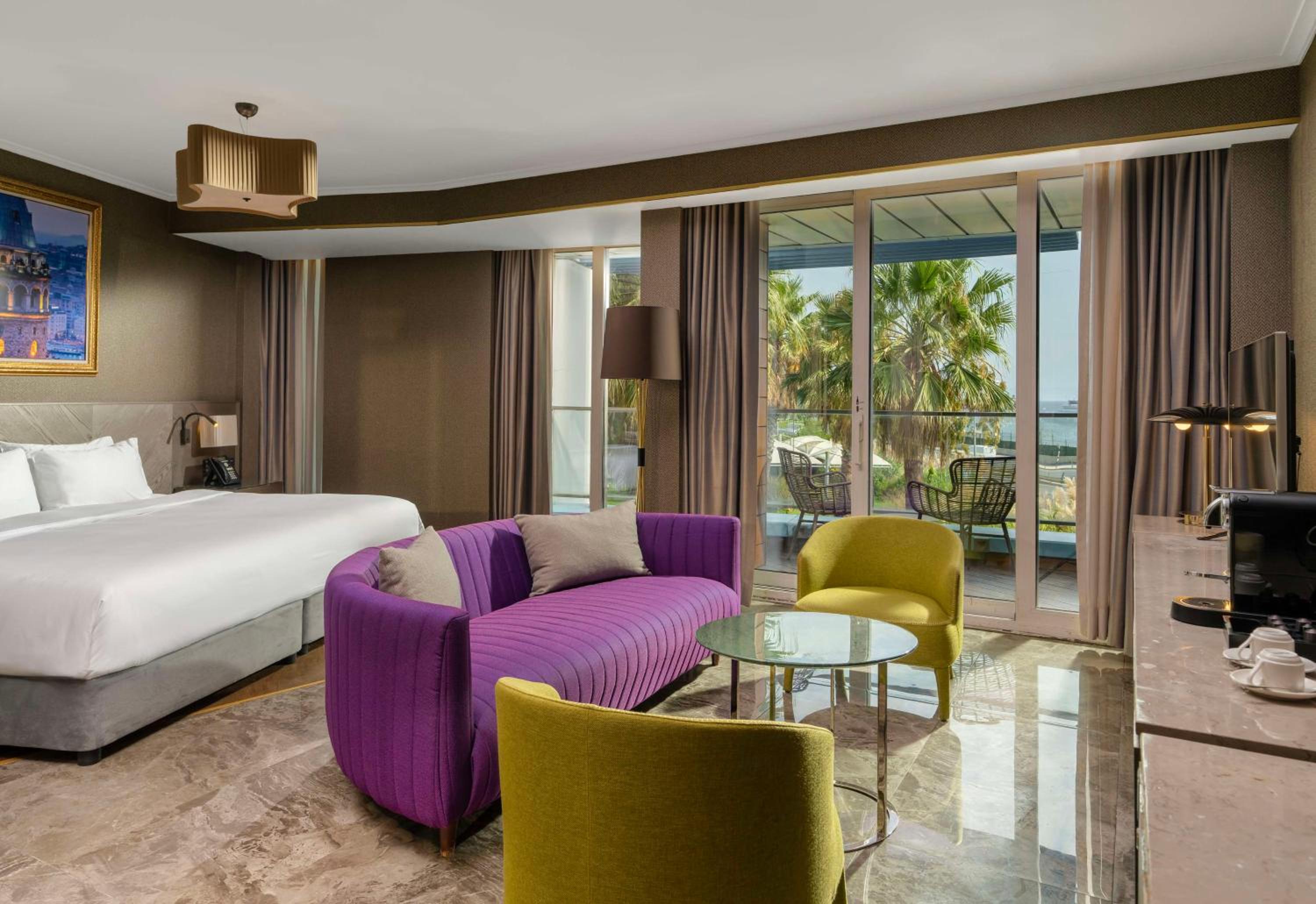 Junior Suite with Balcony and Garden View
