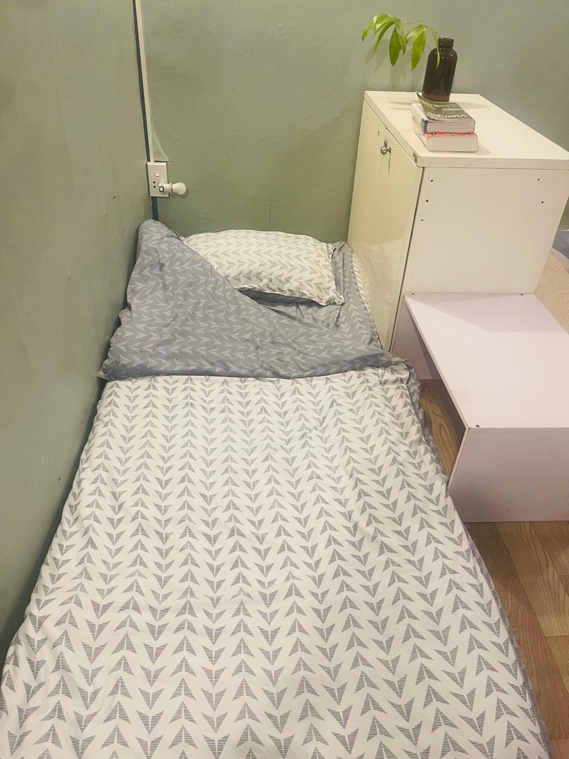 Single Bed In Dormitory Room