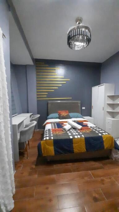 Three-Bedroom Apartment photo 1