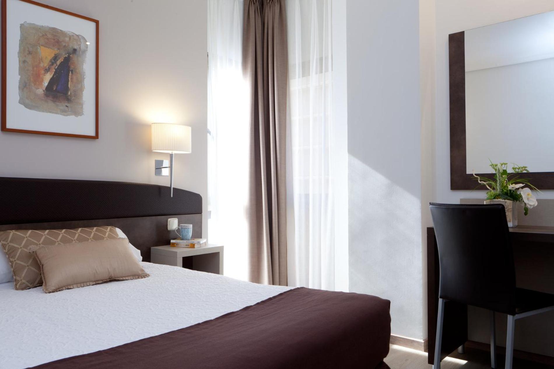 Habitación Doble con cama supletoria (2 adultos + 1 niño menor de 12 años)