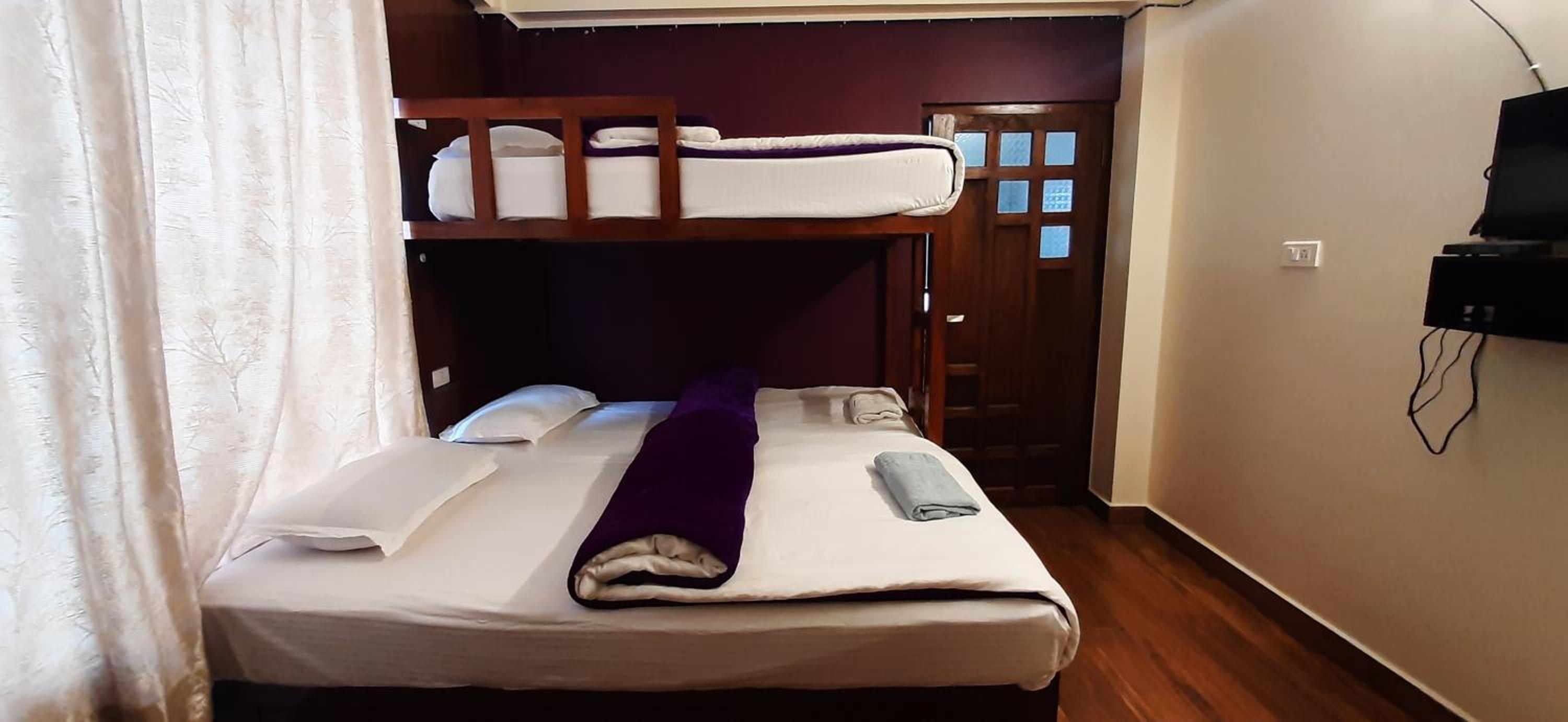 Deluxe Triple Room - Photo 7