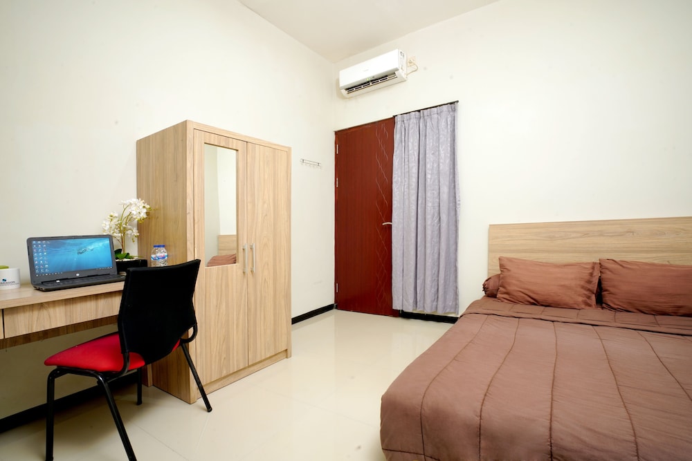 Deluxe Room - Photo 1