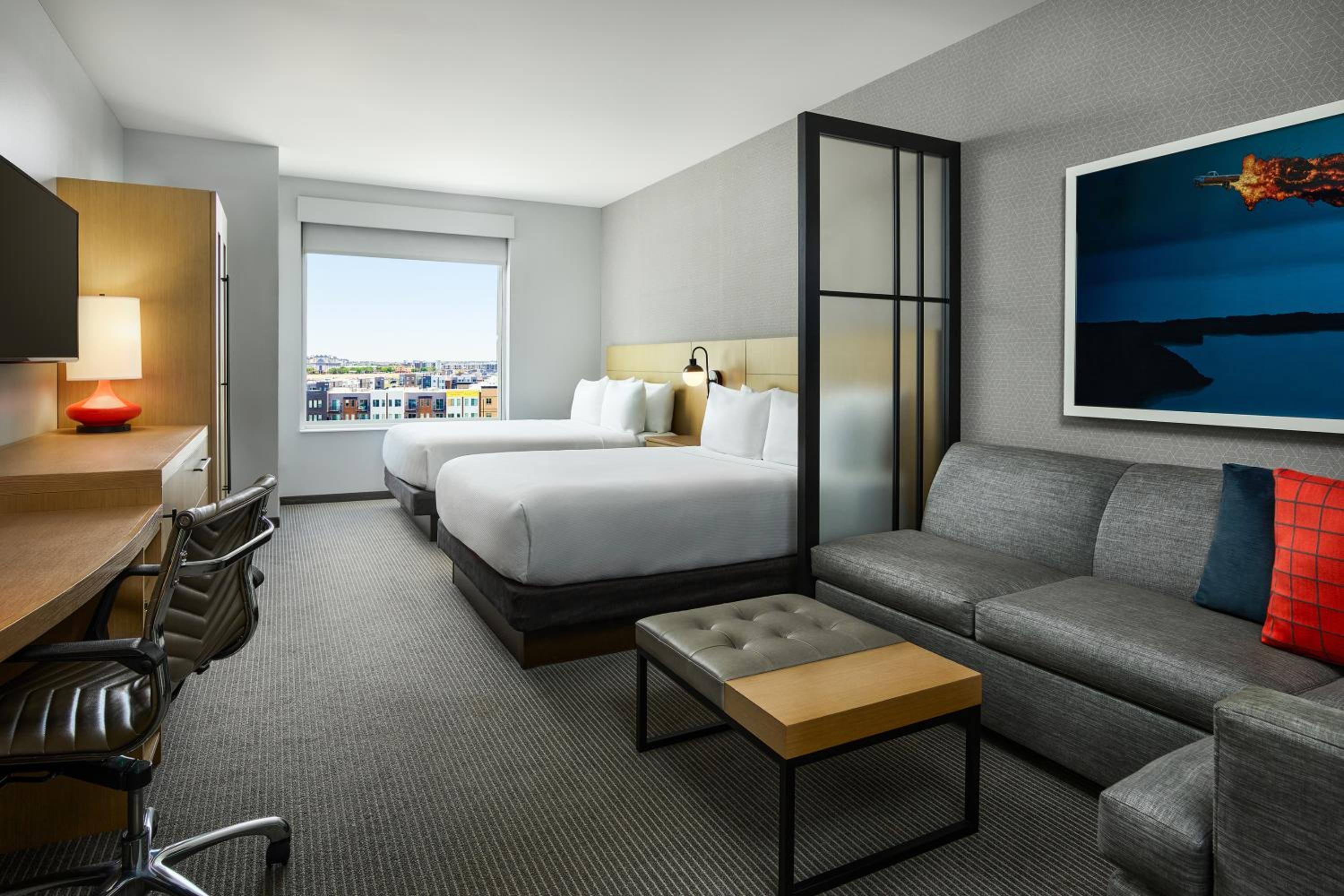Queen Room with Two Queen Beds and Sofa Bed photo 2