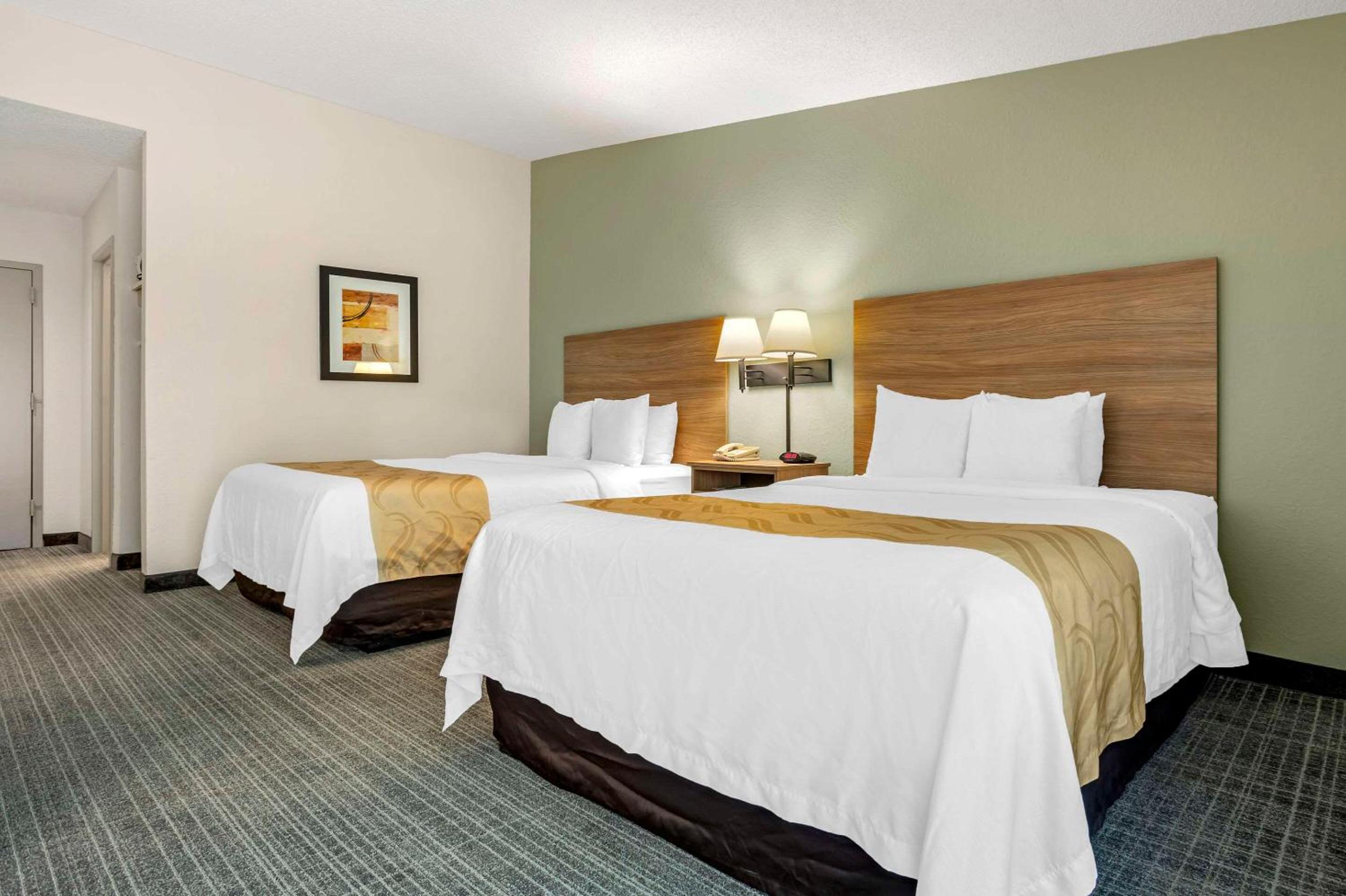 Queen Room with Two Queen Beds - Non-Smoking - Photo 1