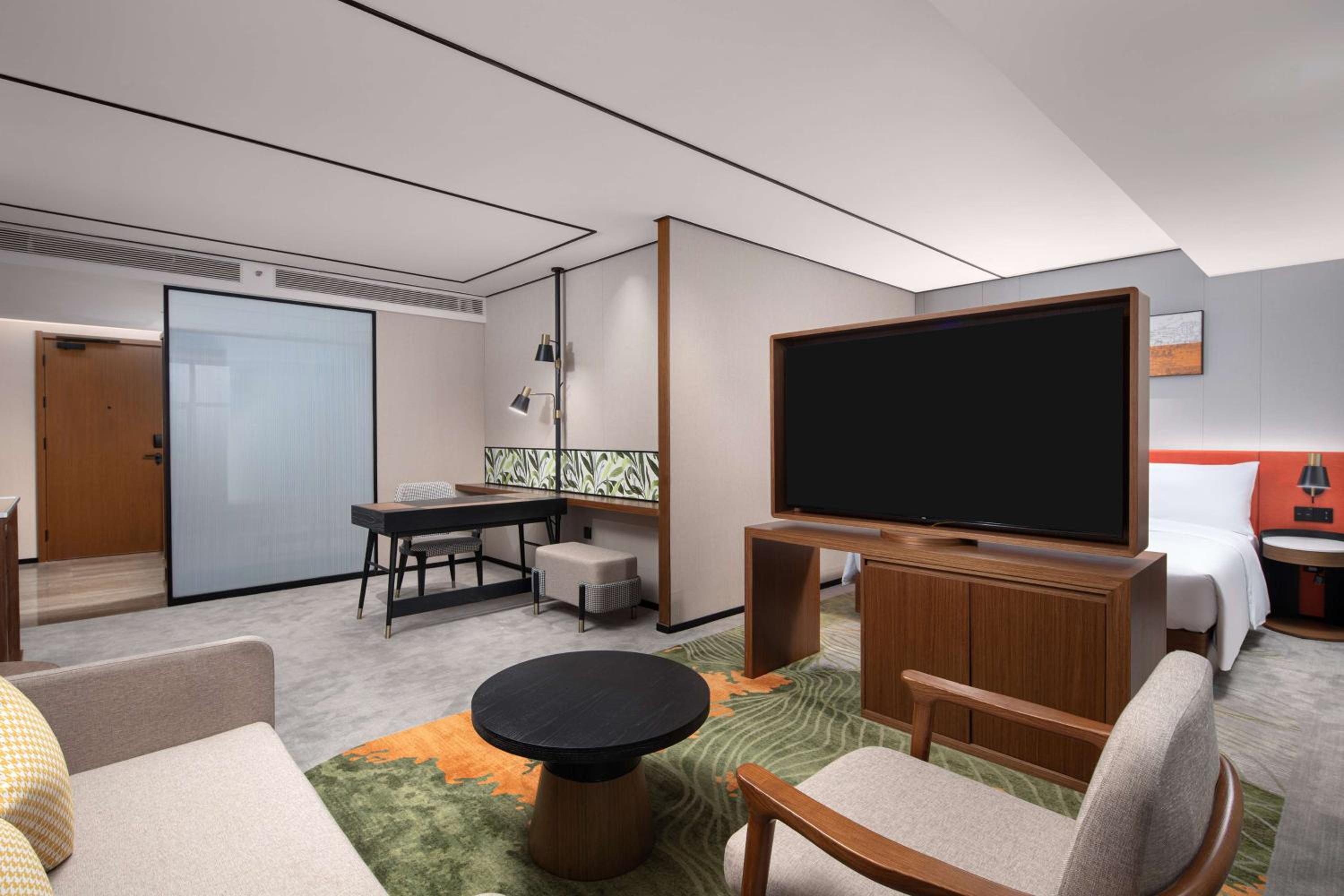 Deluxe King Room with Sofa Bed photo 1
