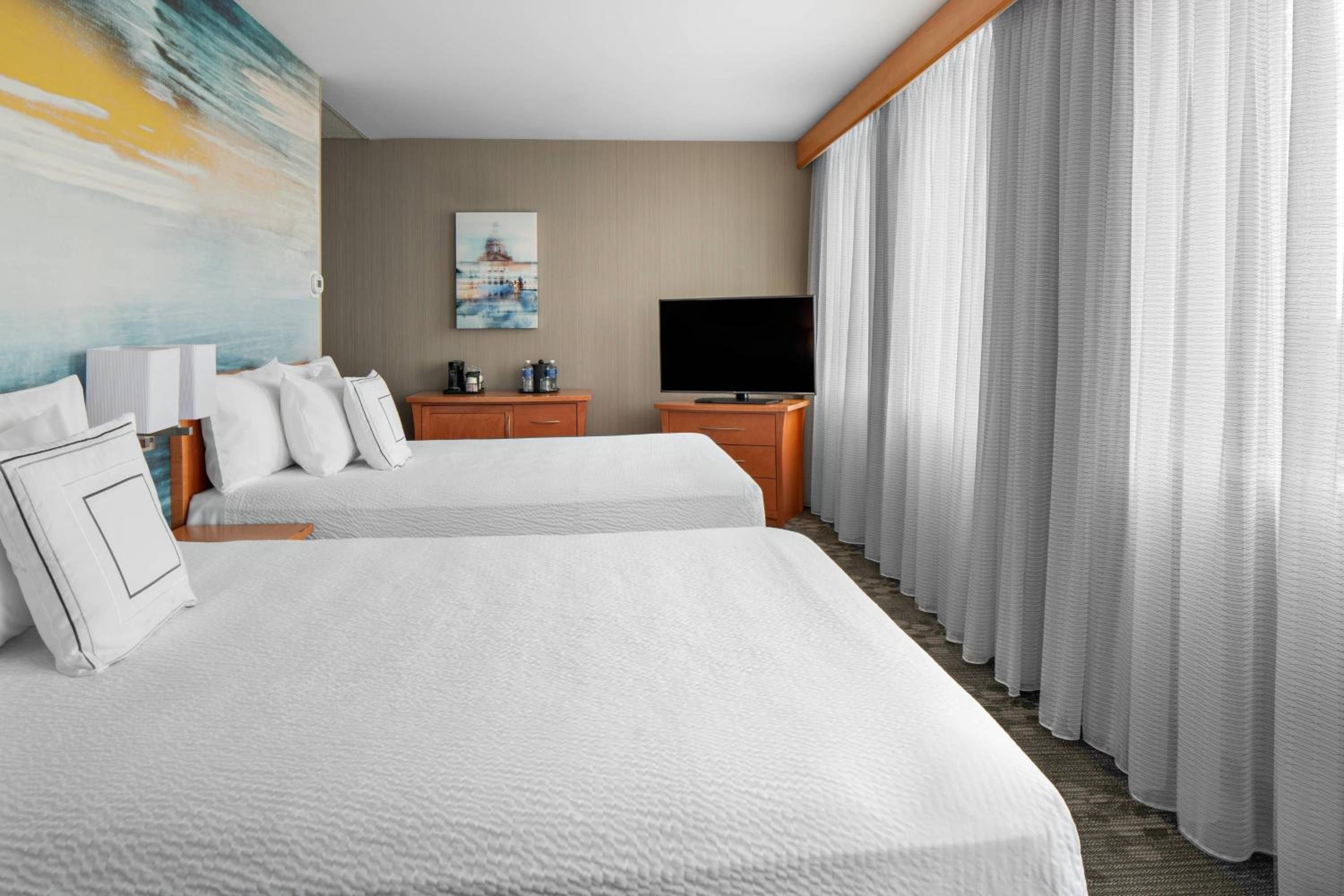 Queen Room with Two Queen Beds - Photo 1