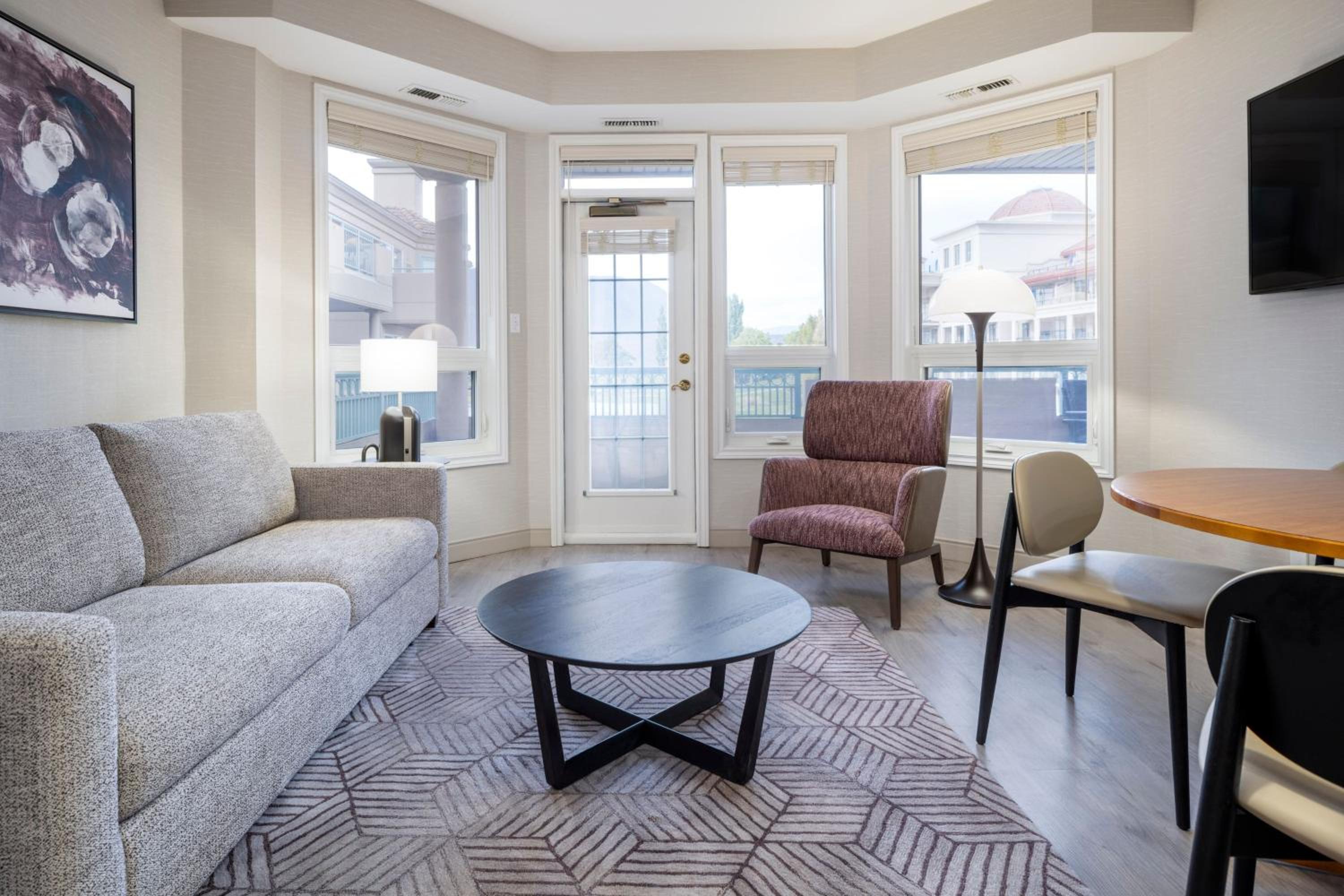 Two-Bedroom Condominium with Balcony and City View