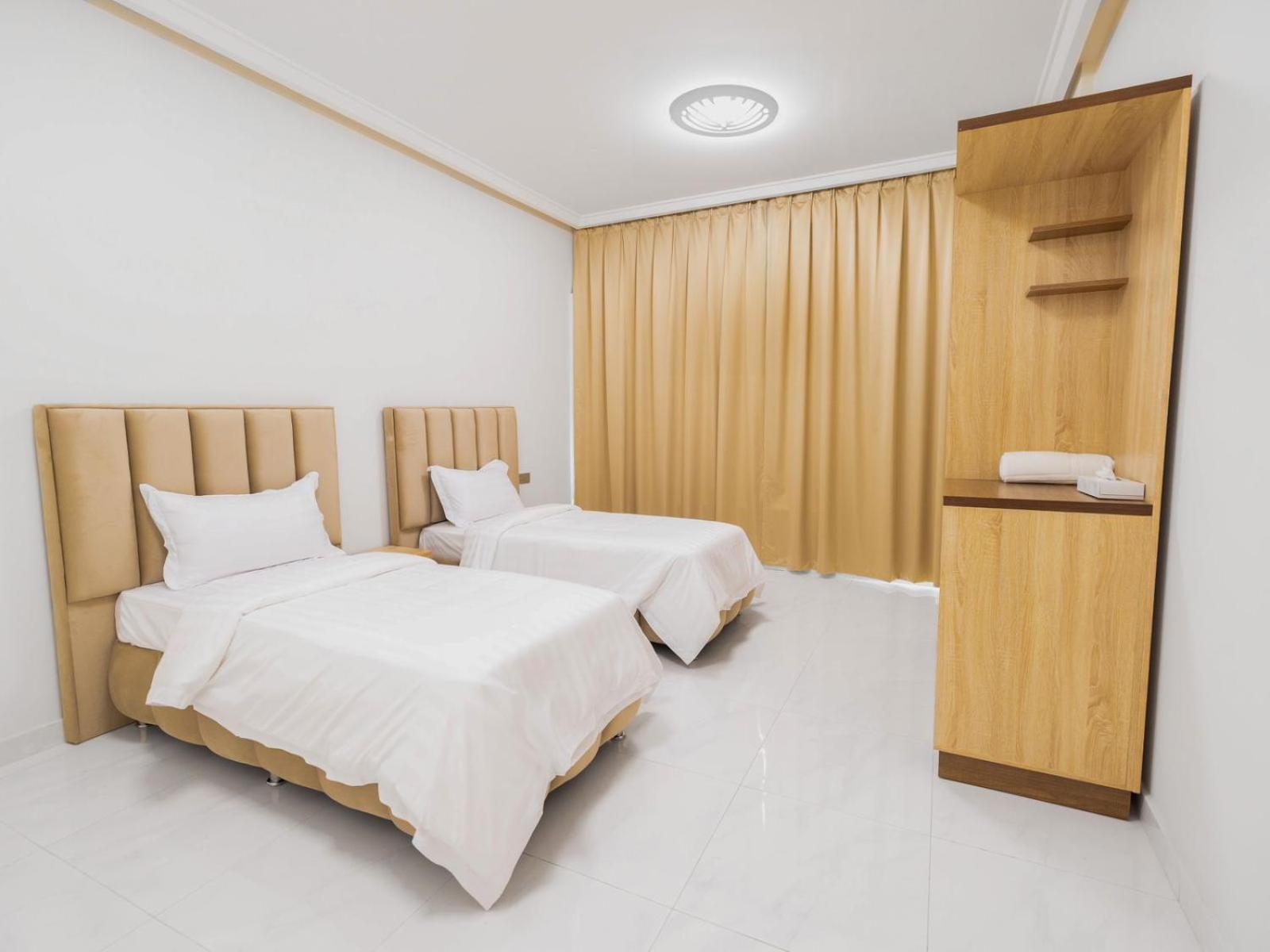 Standard Queen Room with Two Queen Beds photo 2