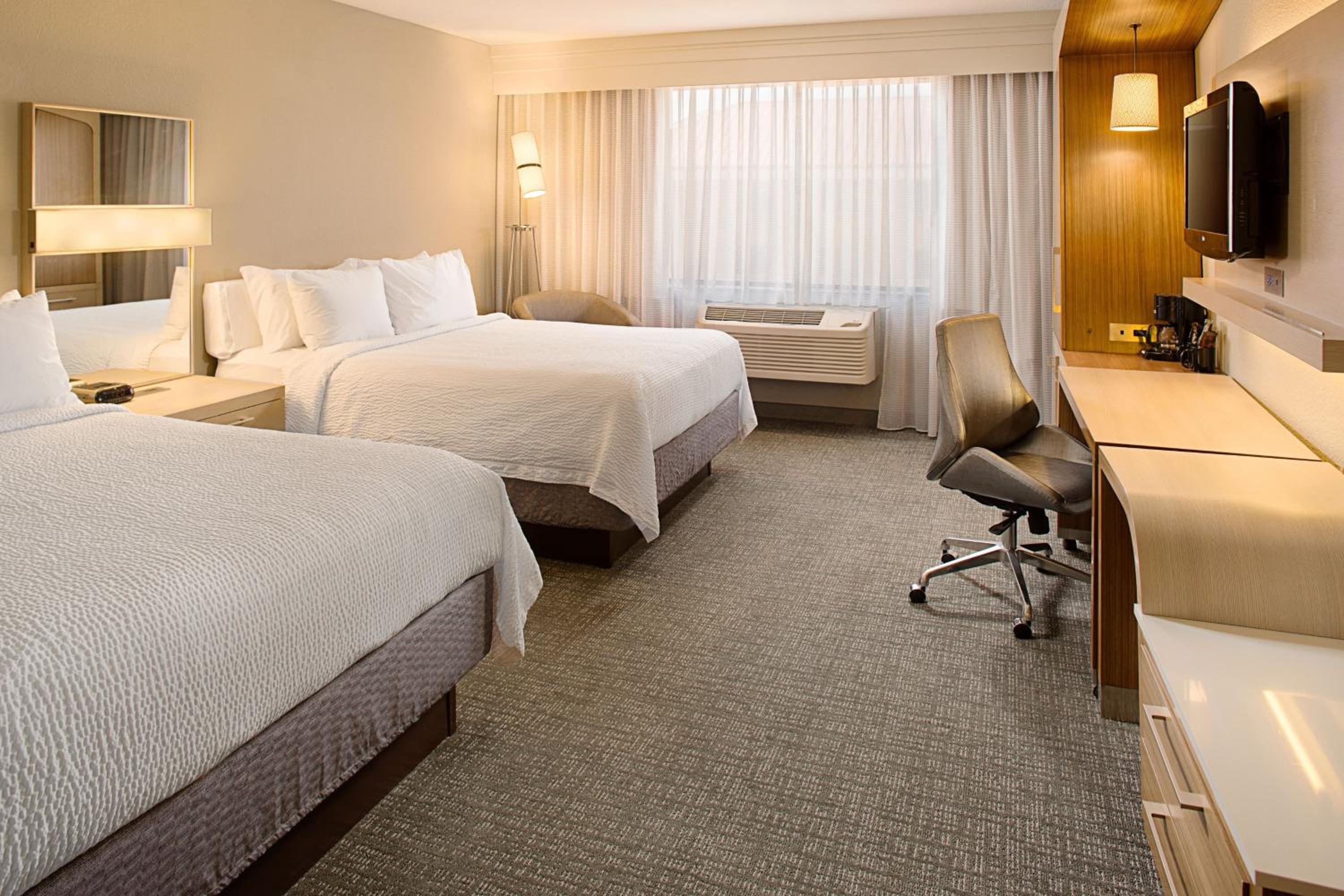 Queen Room with Two Queen Beds - Photo 1