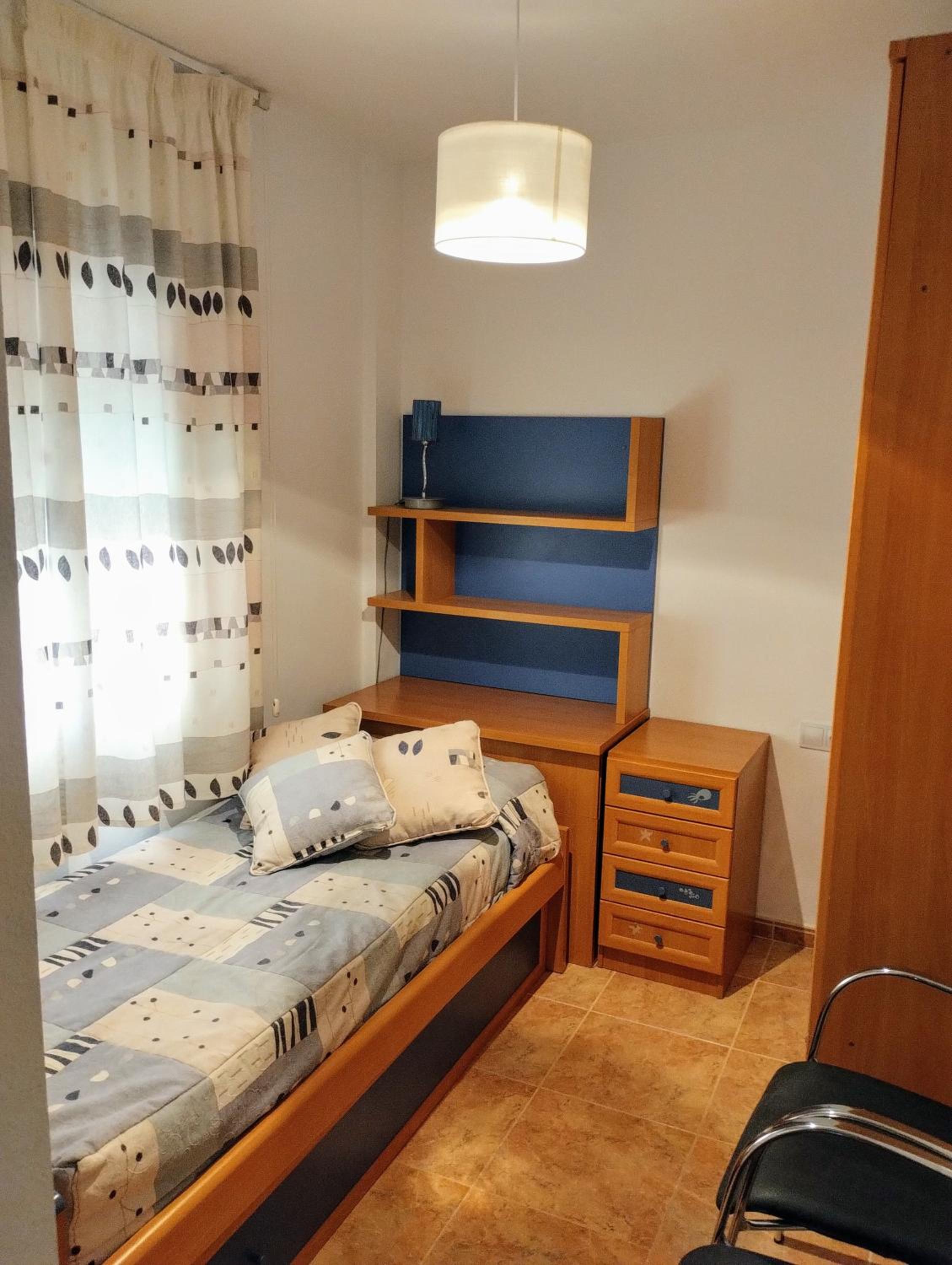 Three-Bedroom Apartment photo 2