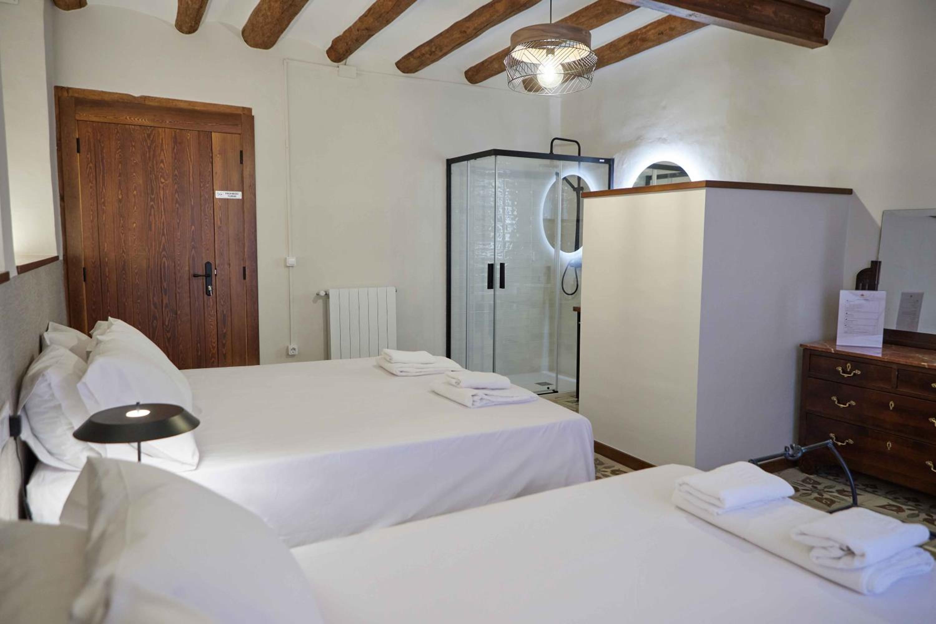 Habitación Doble Deluxe con Dos Camas Dobles