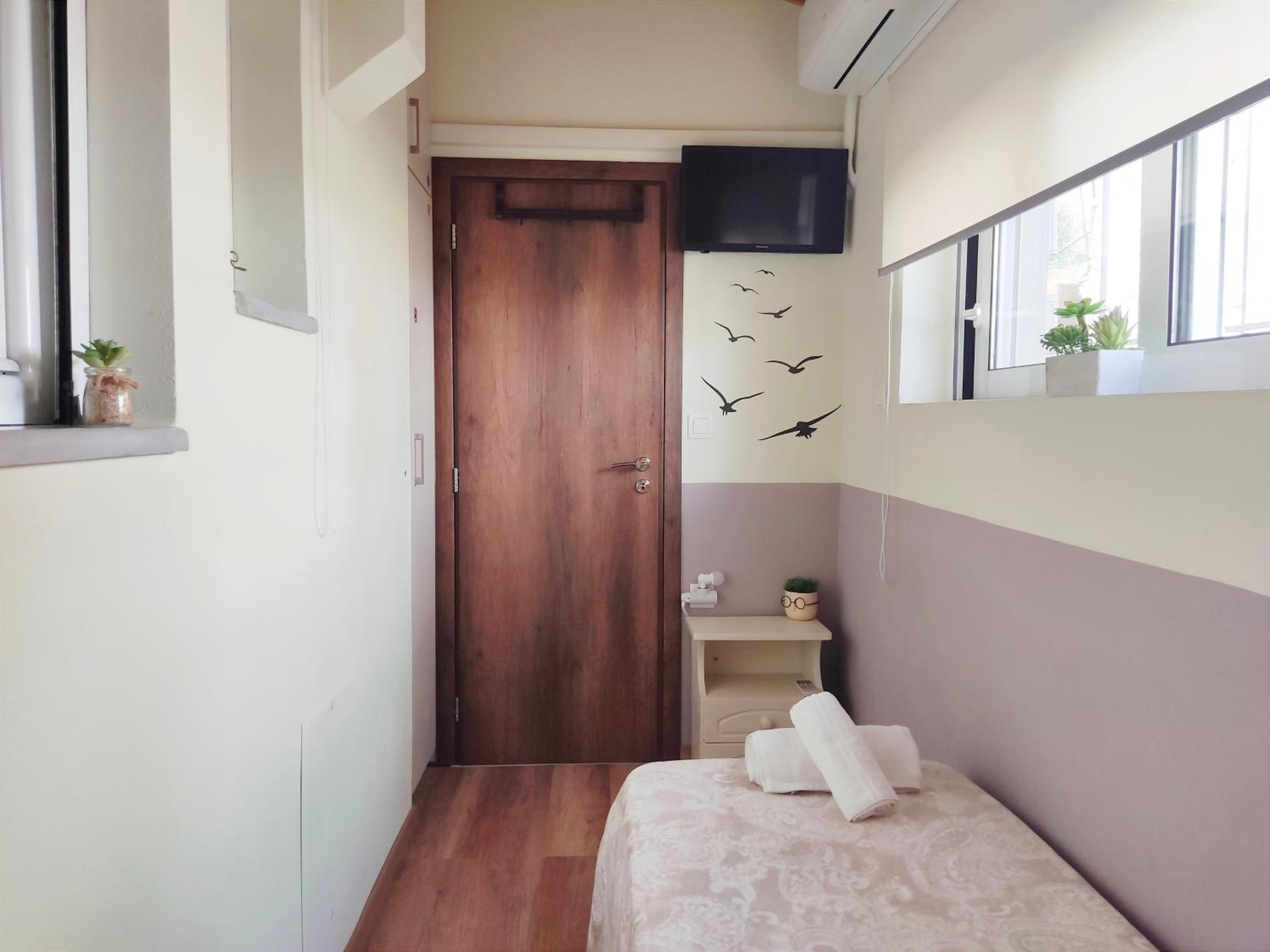 Three-Bedroom Apartment - Photo 18