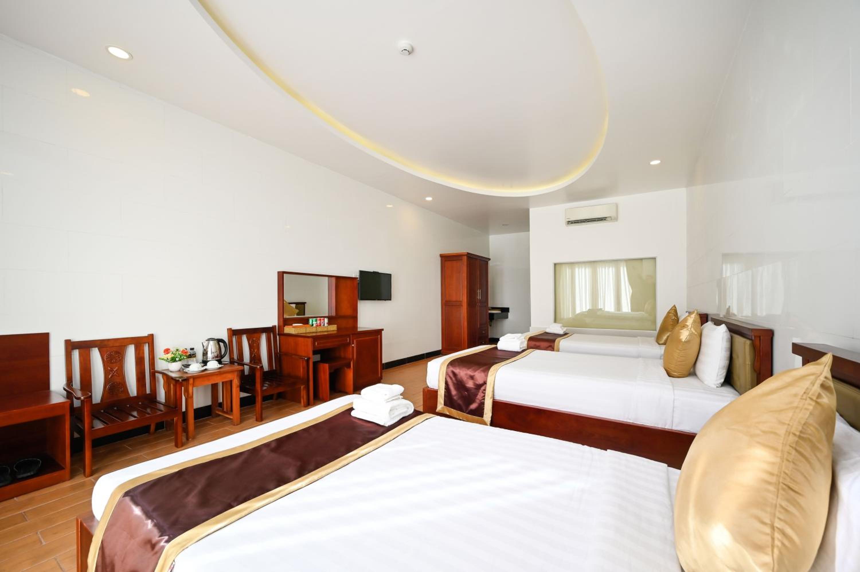 Deluxe Triple Room - Photo 7