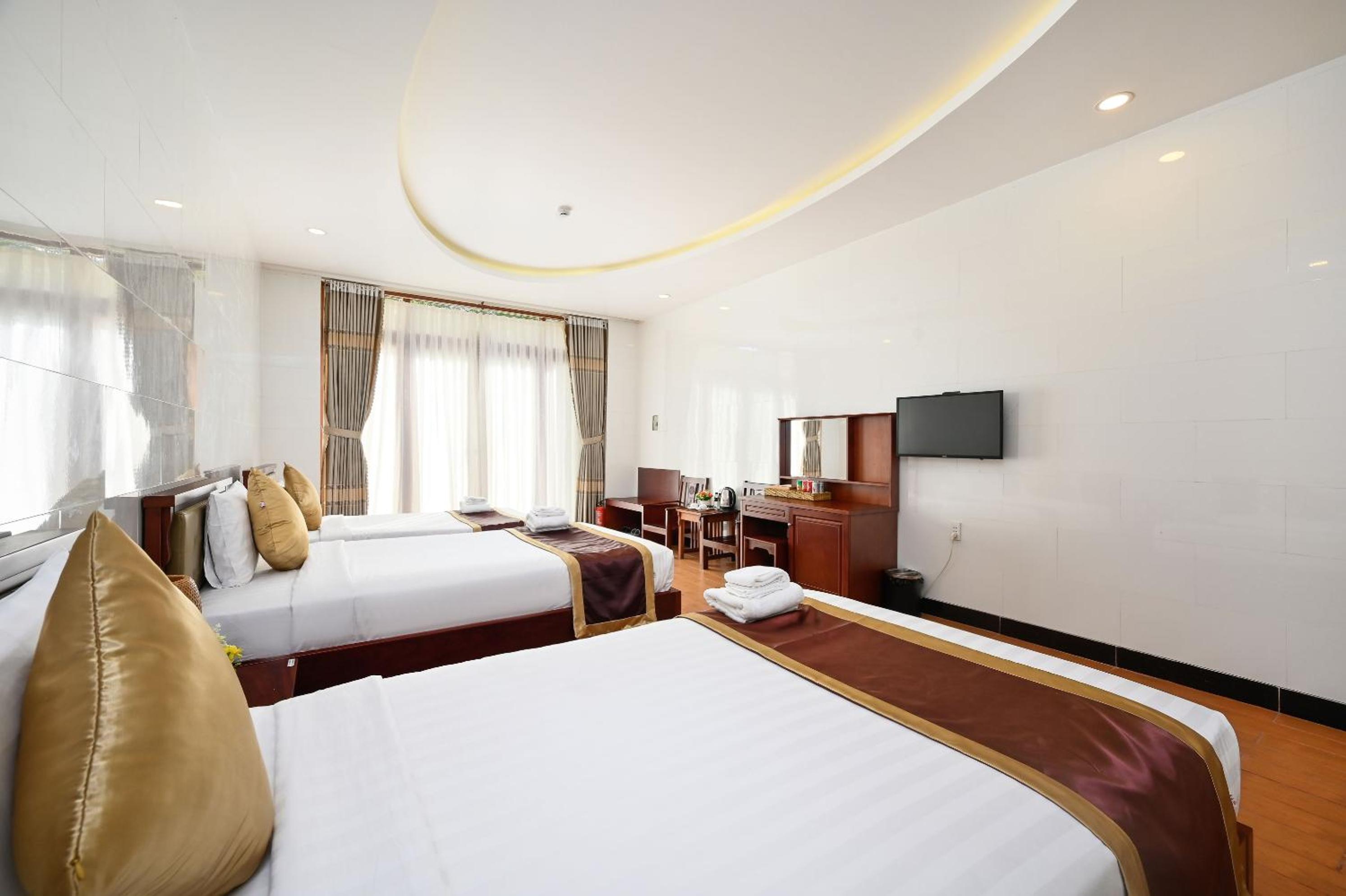 Deluxe Triple Room - Photo 6