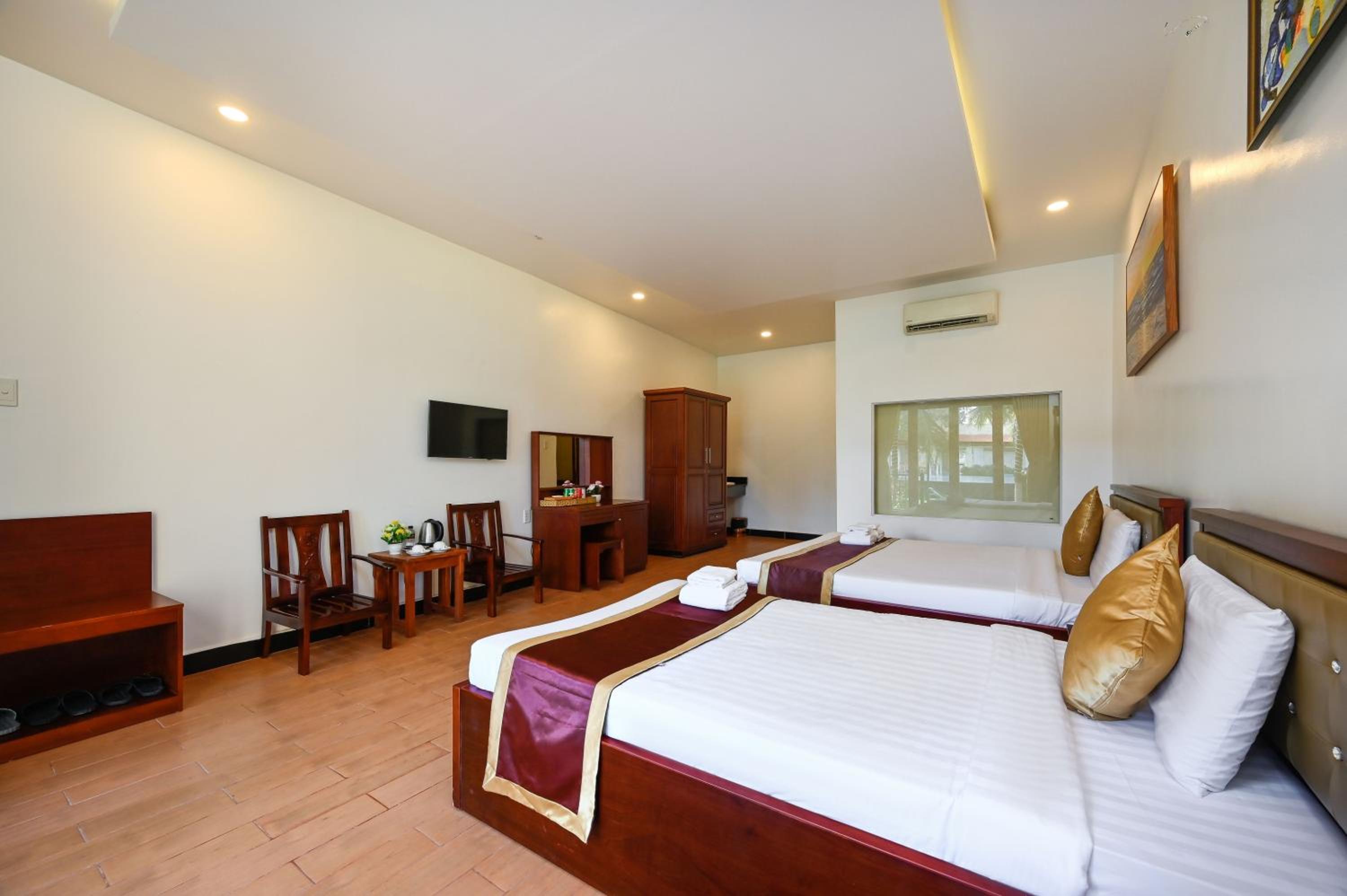 Deluxe Triple Room - Photo 8