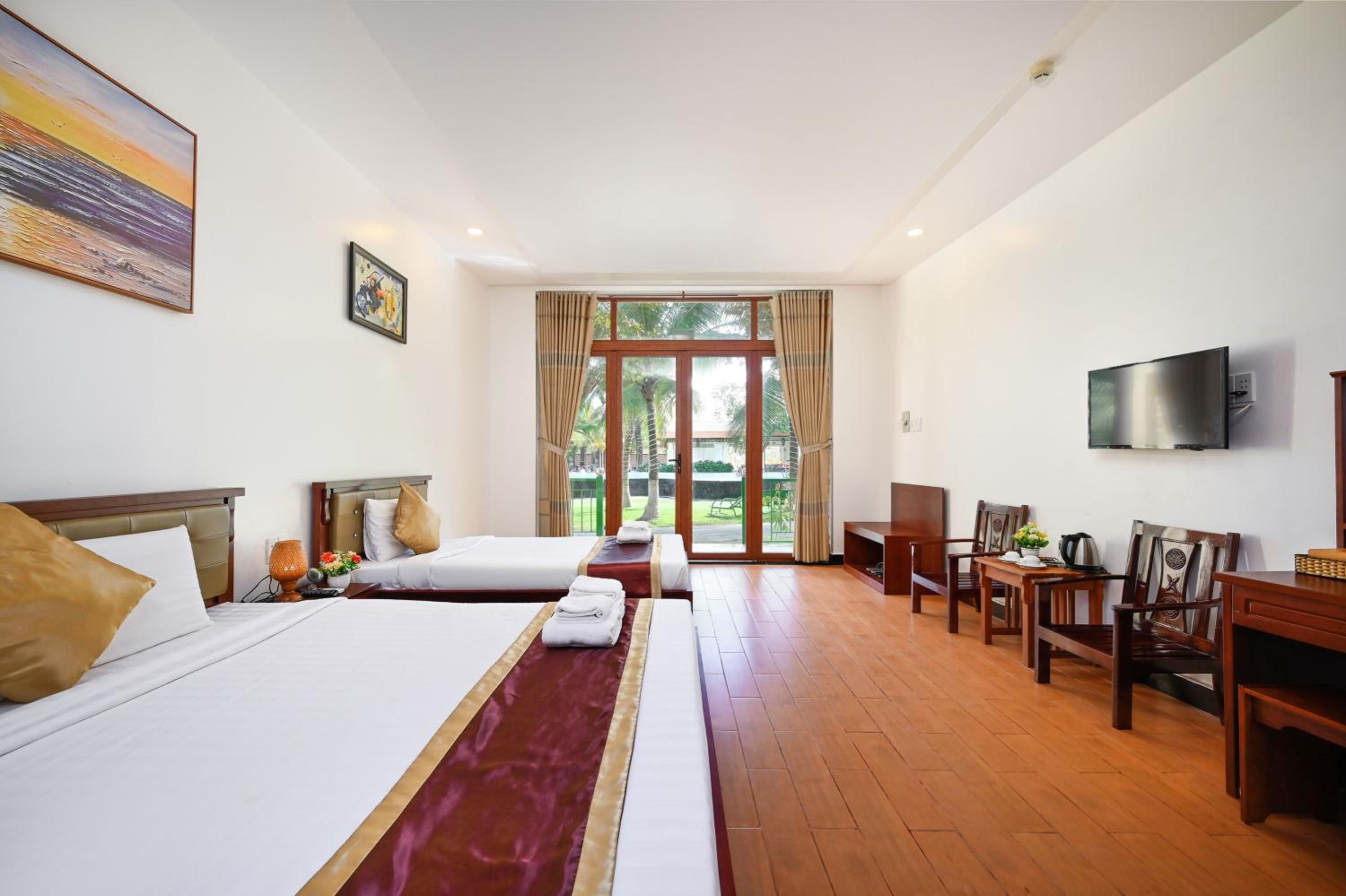 Deluxe Triple Room - Photo 2