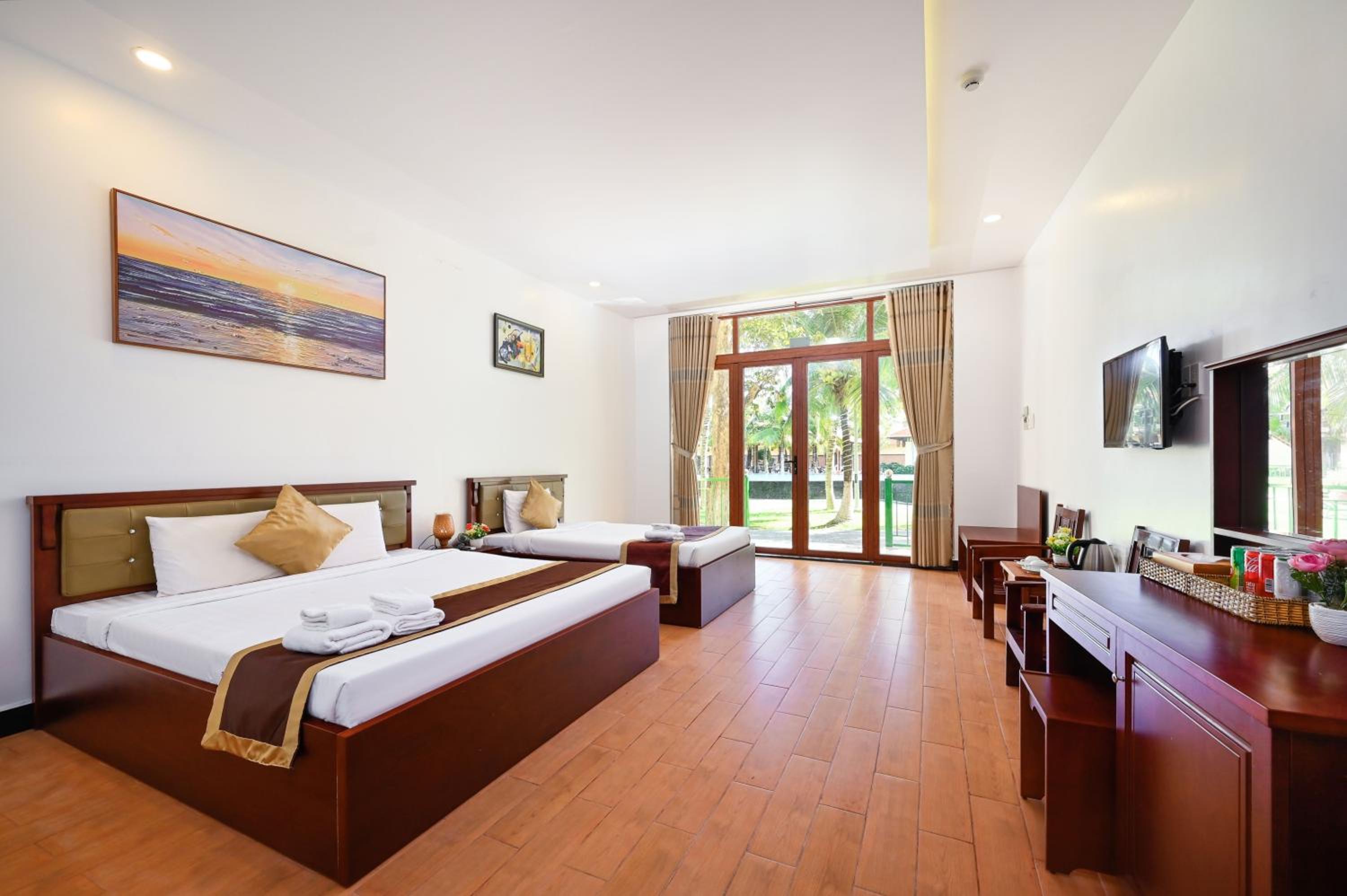 Deluxe Triple Room - Photo 1