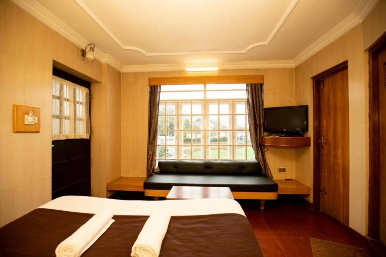 Deluxe Room - Photo 2