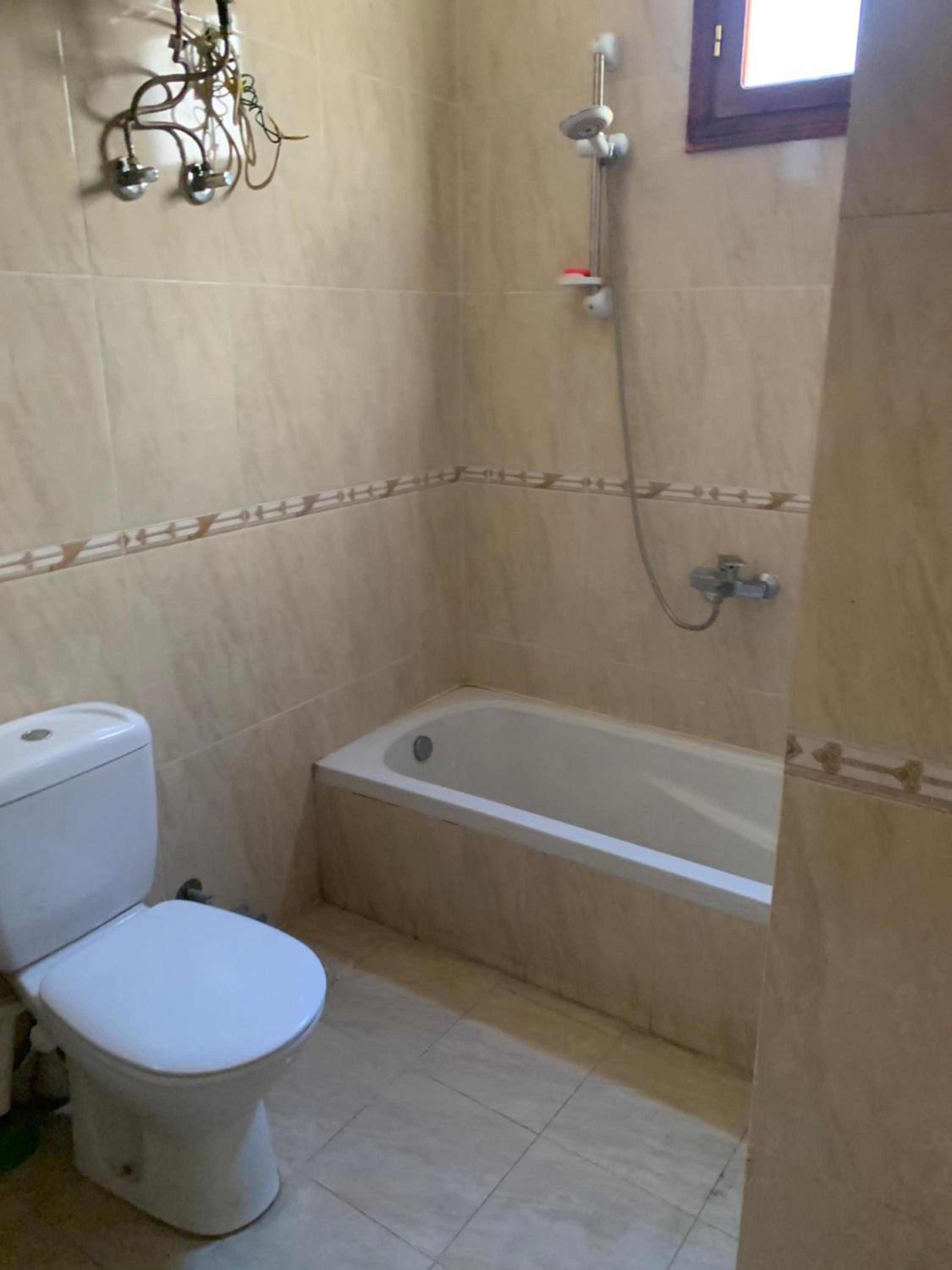 Three-Bedroom Apartment - Photo 25