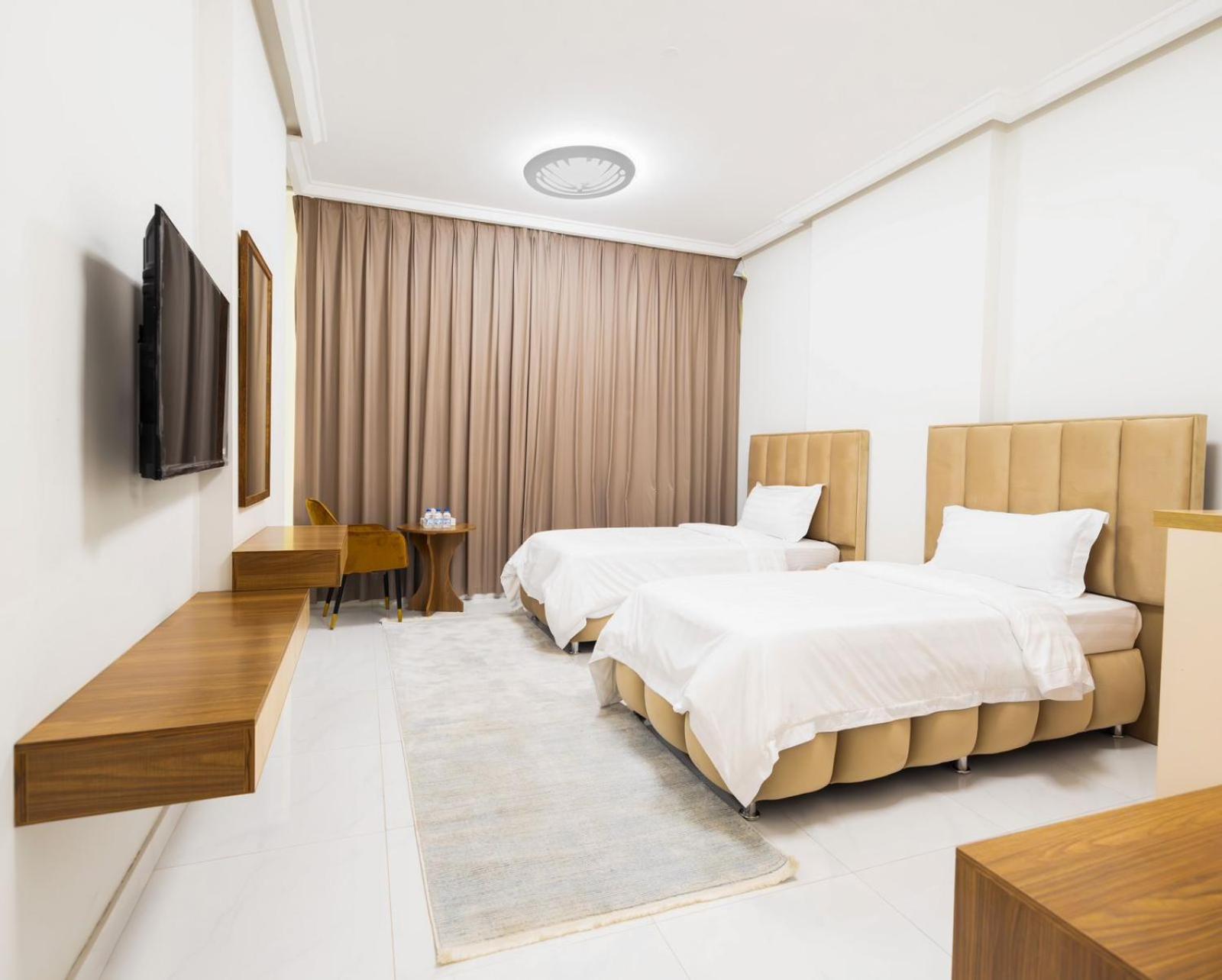 Standard Queen Room with Two Queen Beds photo 1