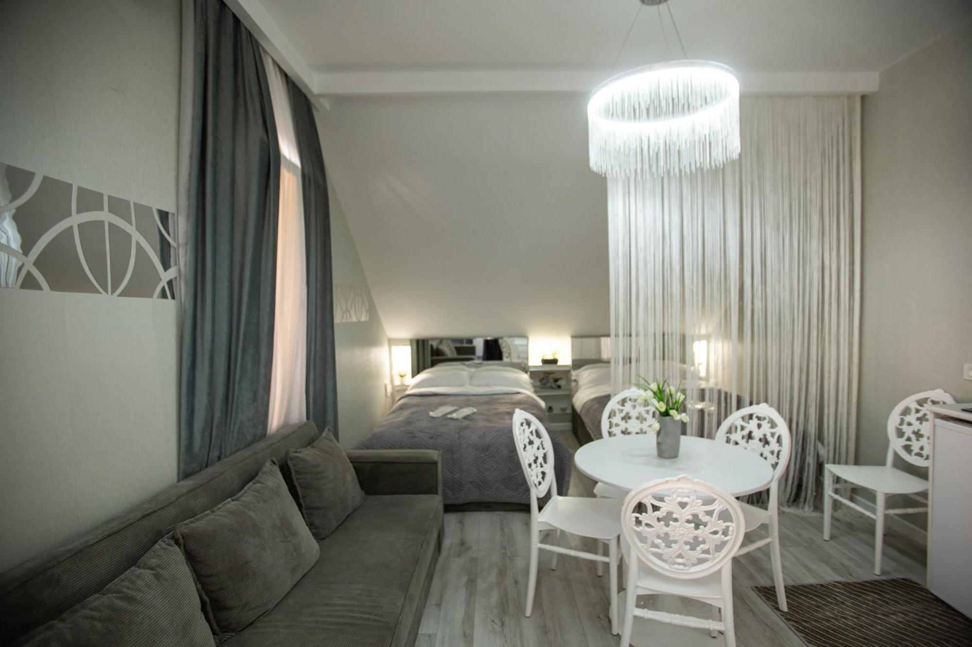 One-Bedroom Apartment with Balcony and City View