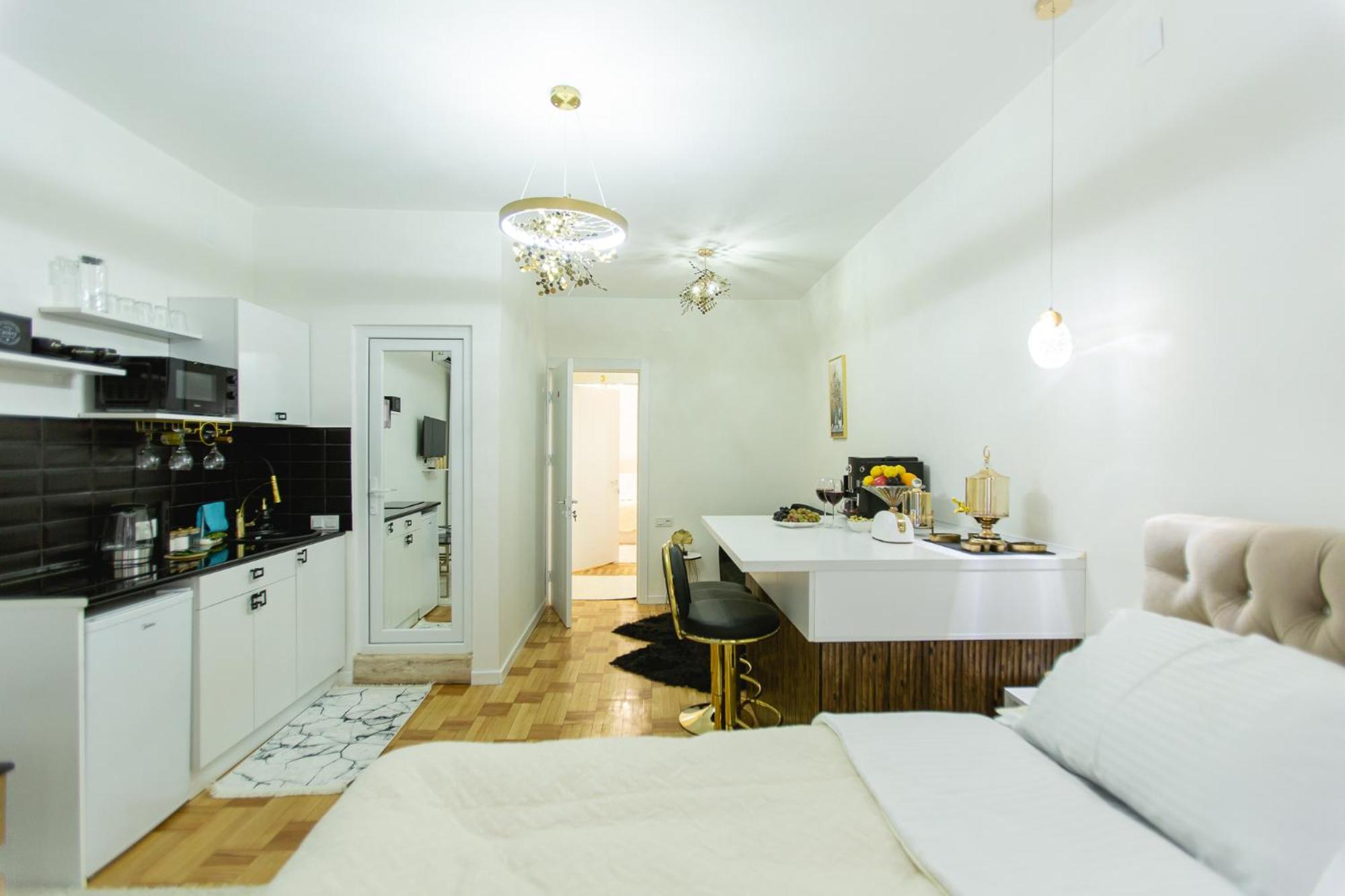 One-Bedroom Apartment with Balcony and City View