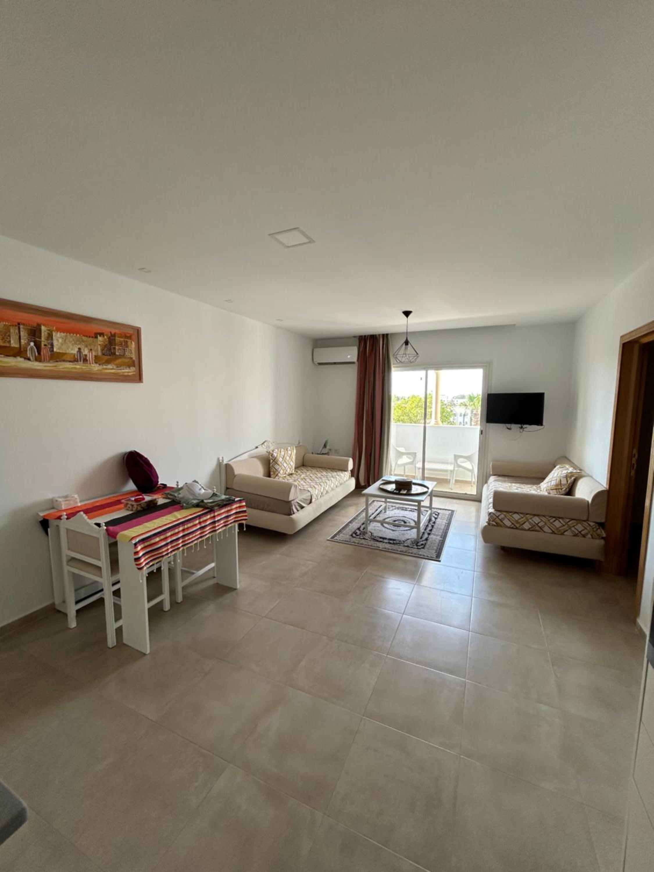 One-Bedroom Apartment with Balcony and Sea View