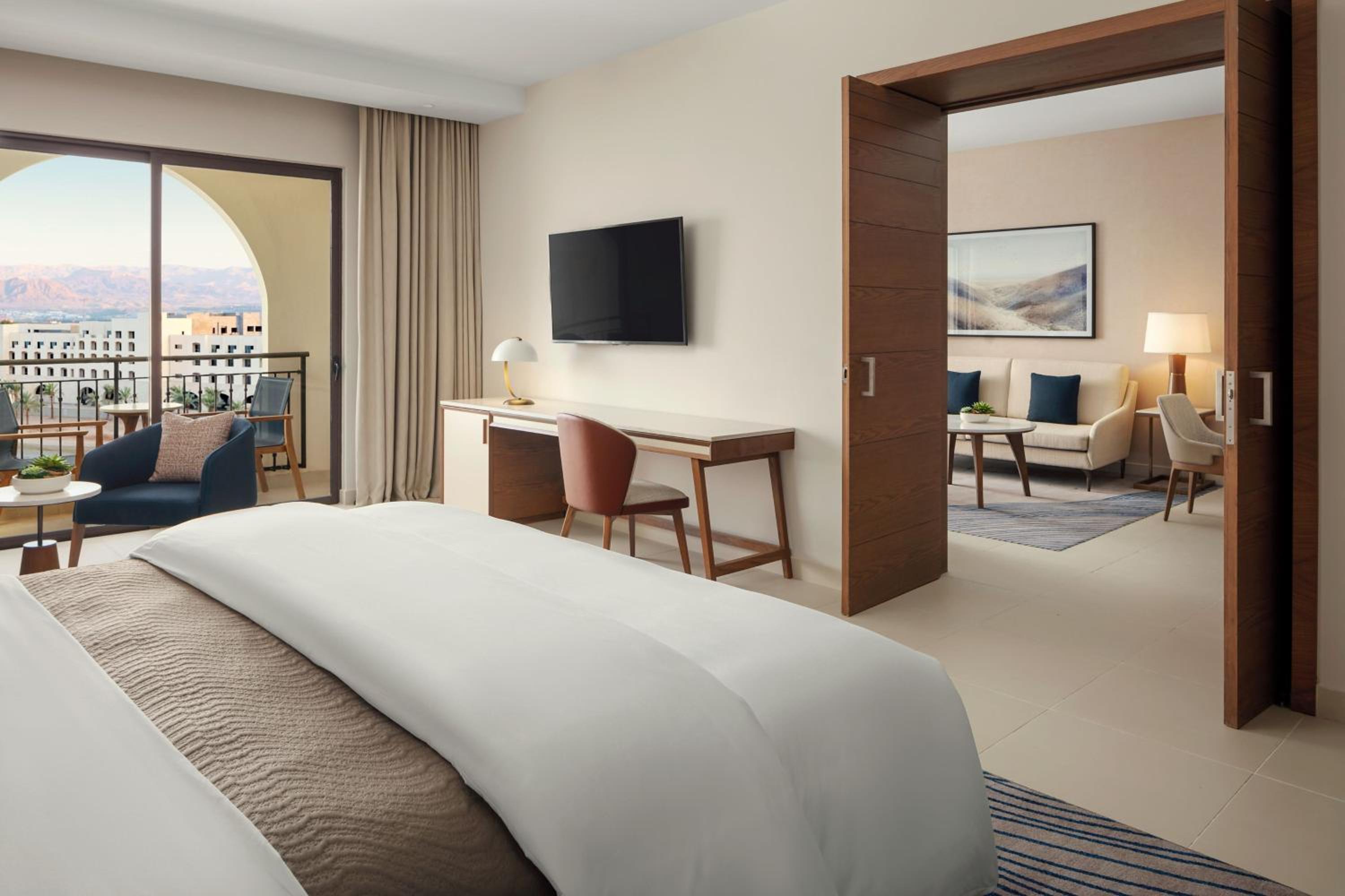 Prestige King Suite with Balcony - Pool View photo 1