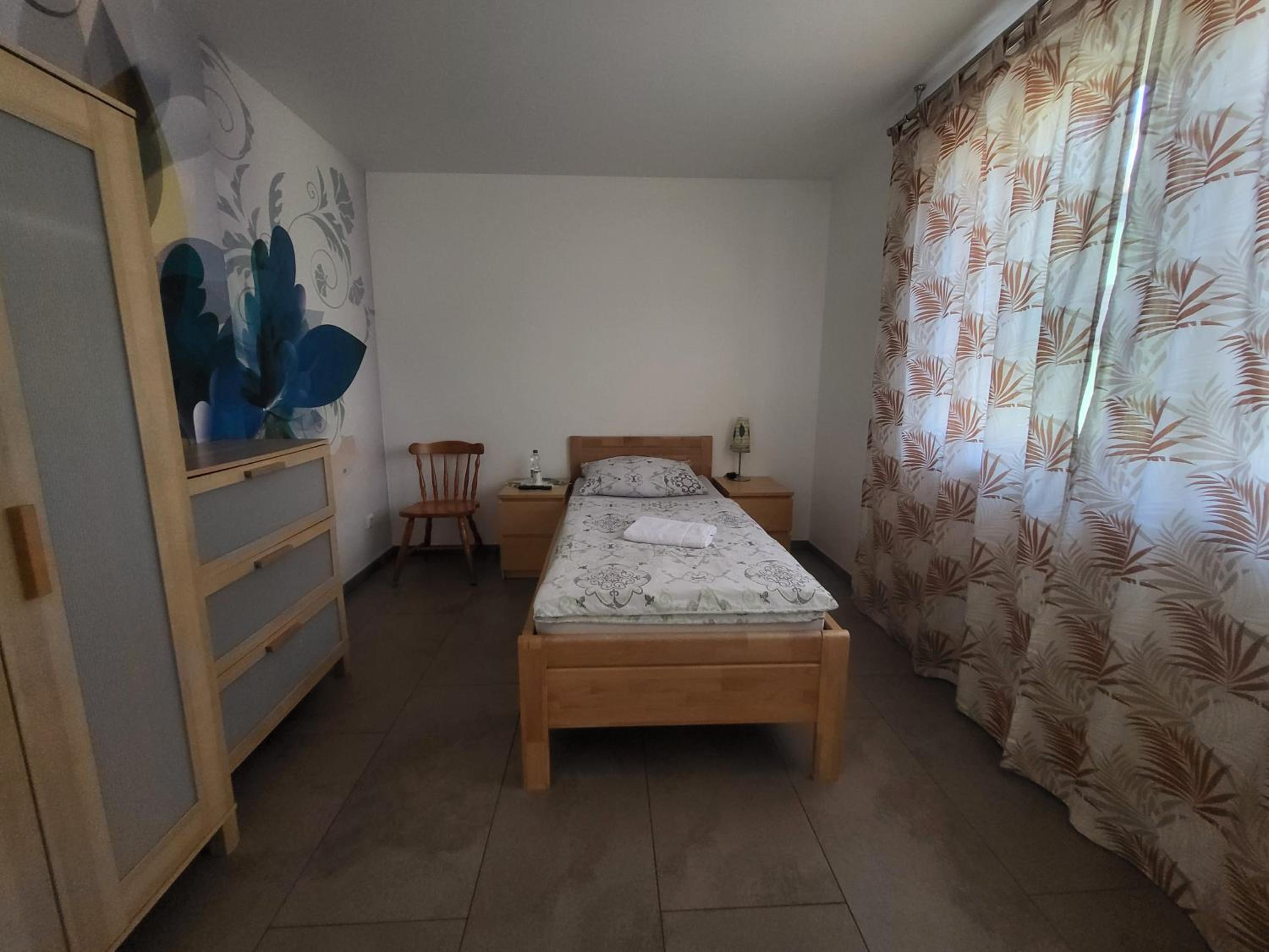 Single Room With Shared Shower And Toilet