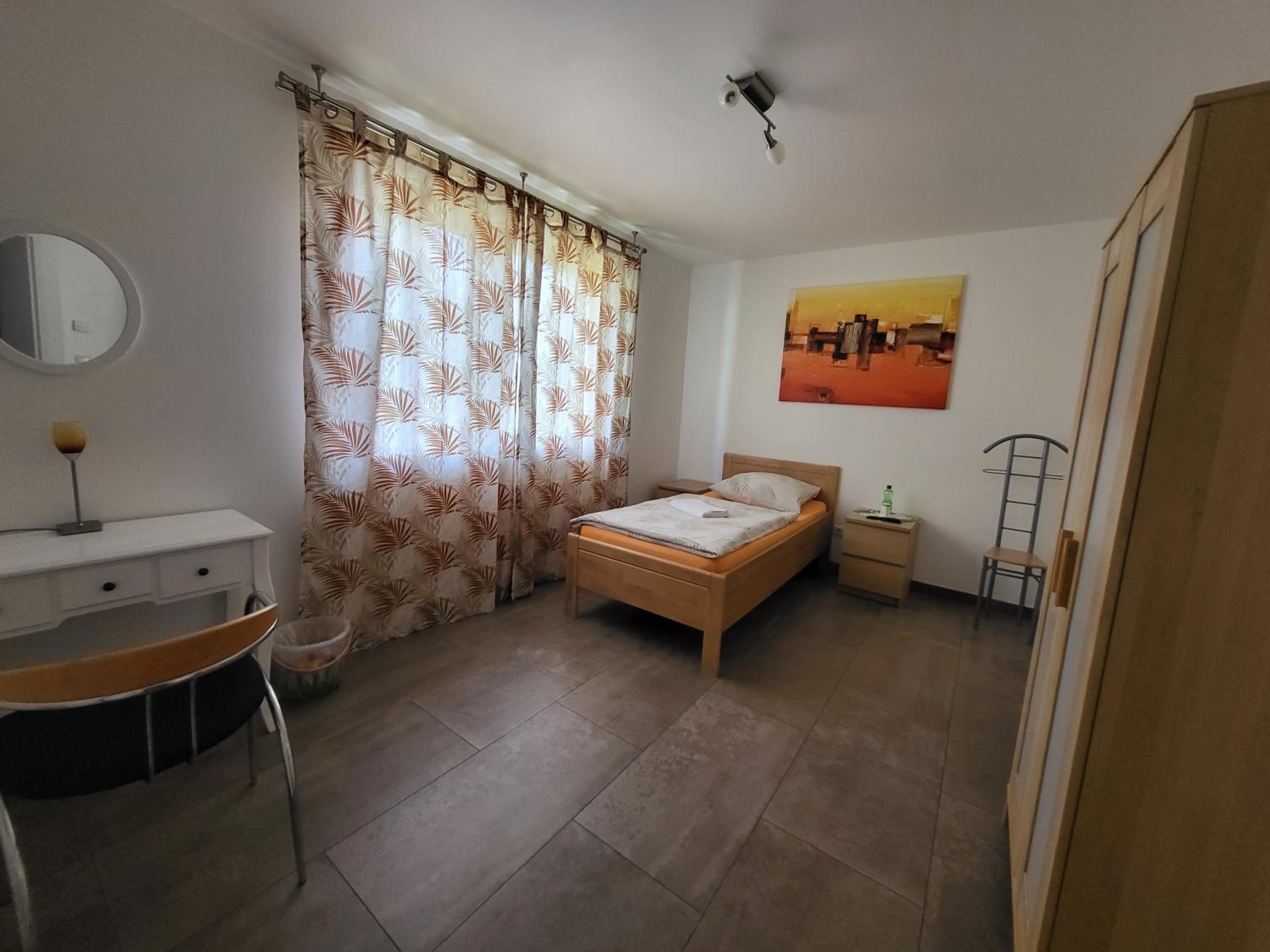 Single Room with Shared Shower and Toilet