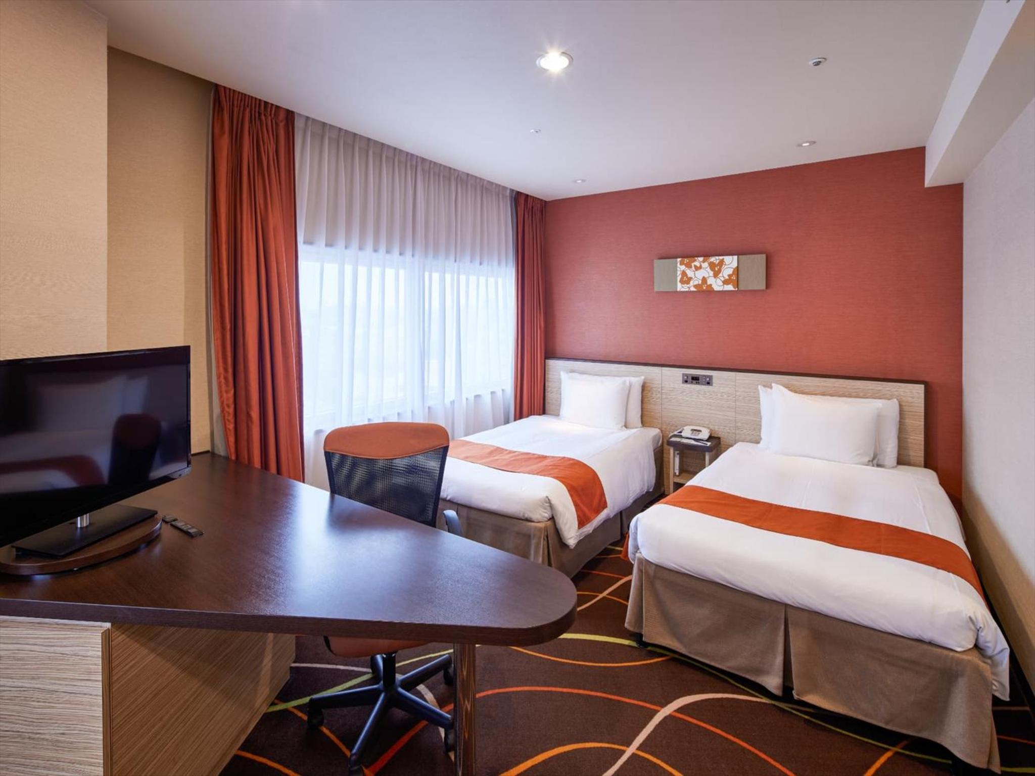Deluxe Twin Room - Photo 10