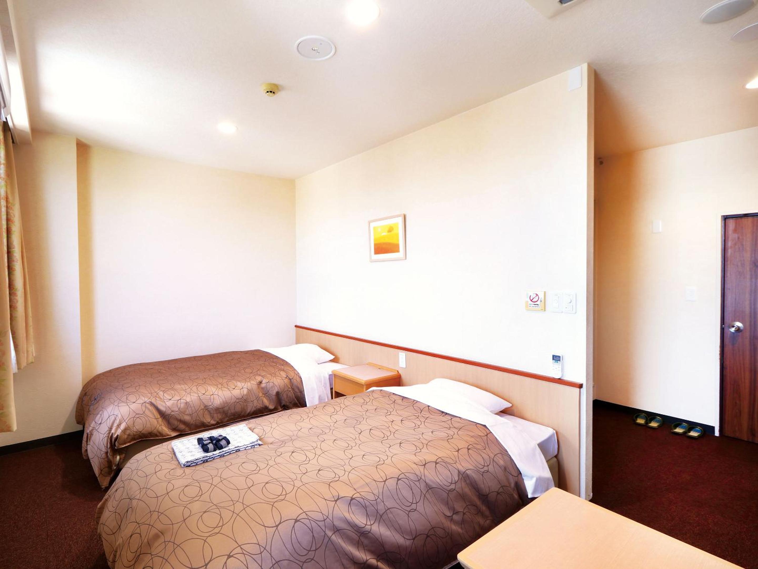 Standard Twin Room - Photo 1