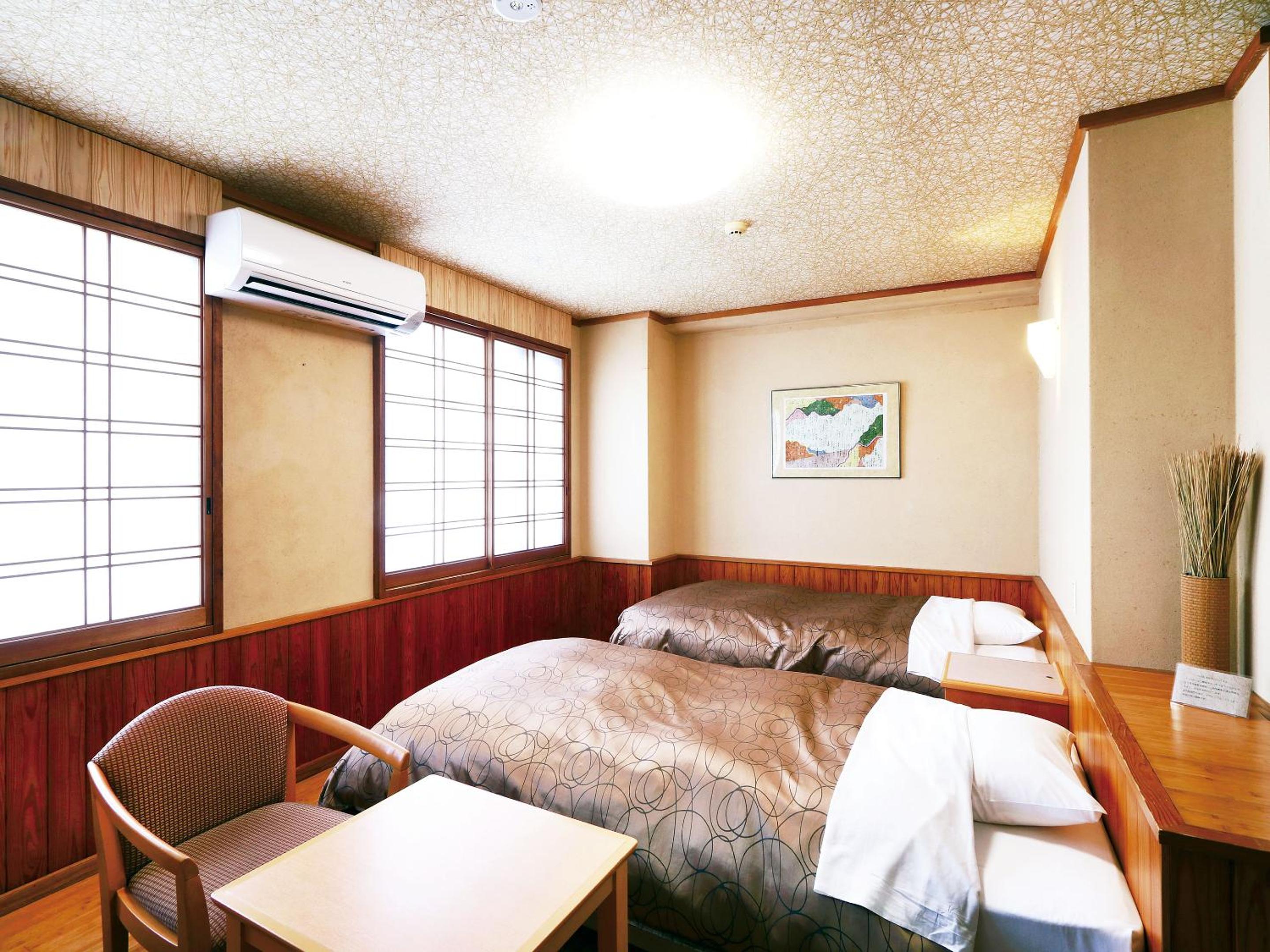 Standard Twin Room - Photo 8