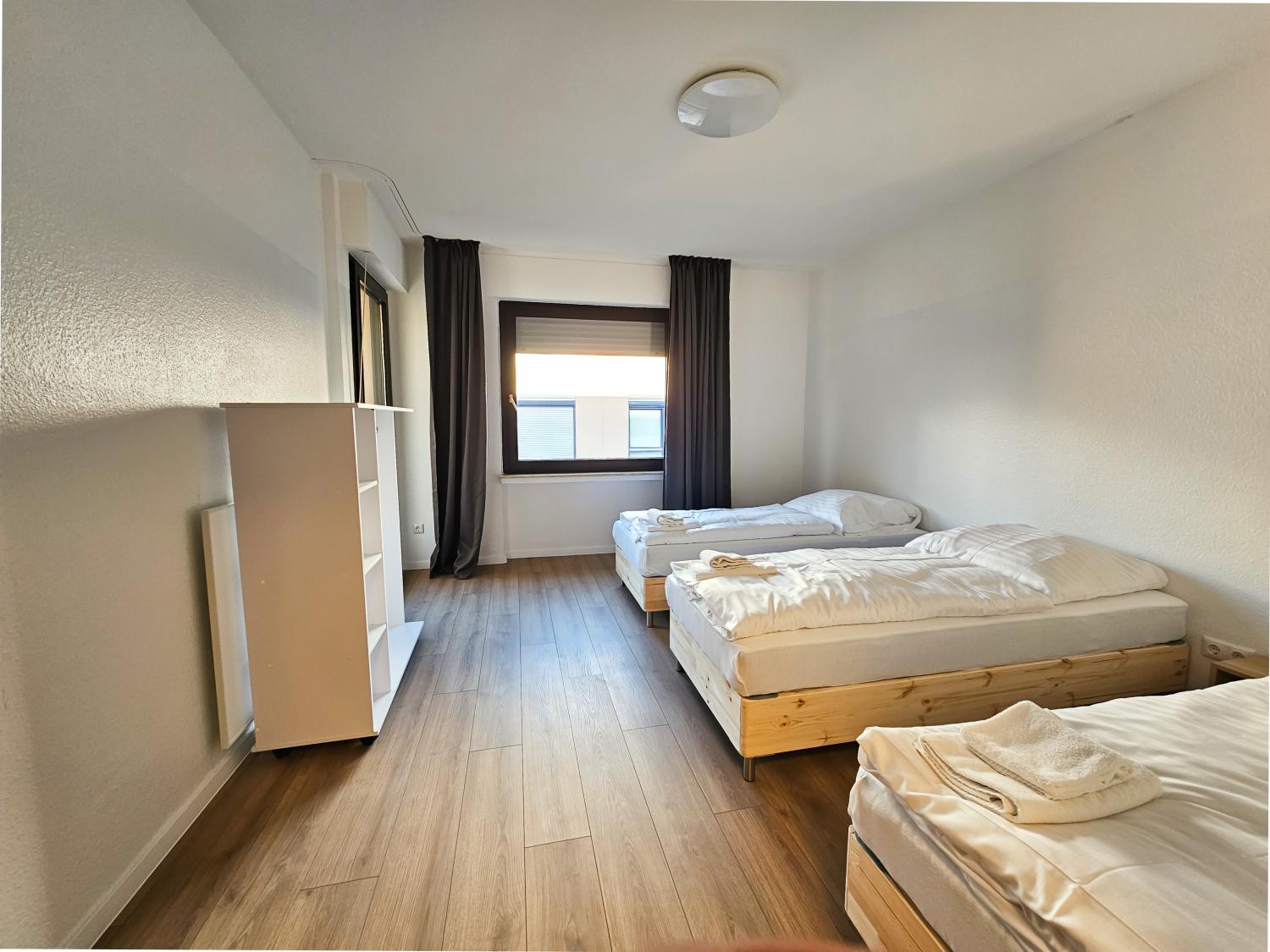 Three-Bedroom Apartment photo 1