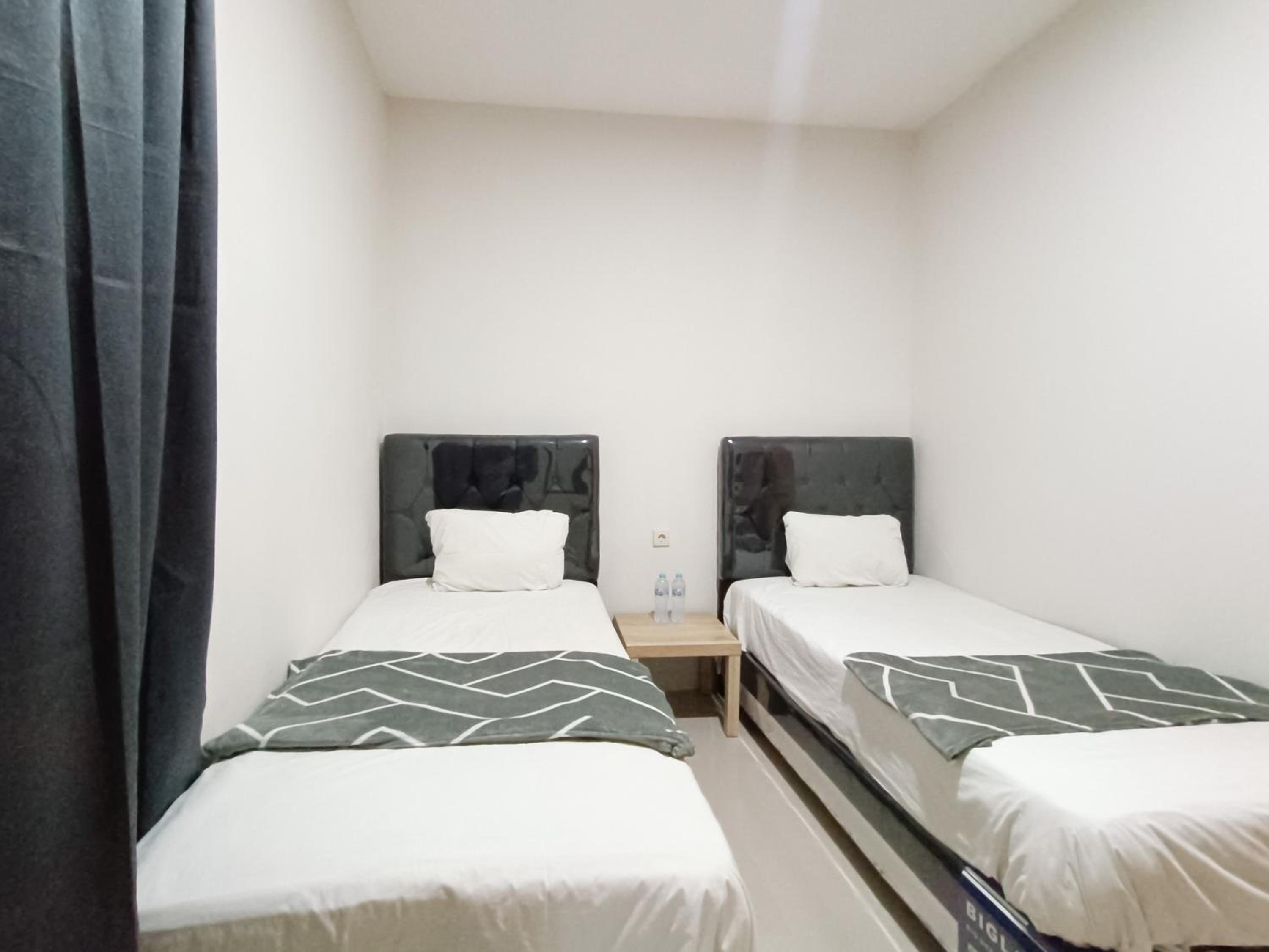 Twin Room - Photo 10