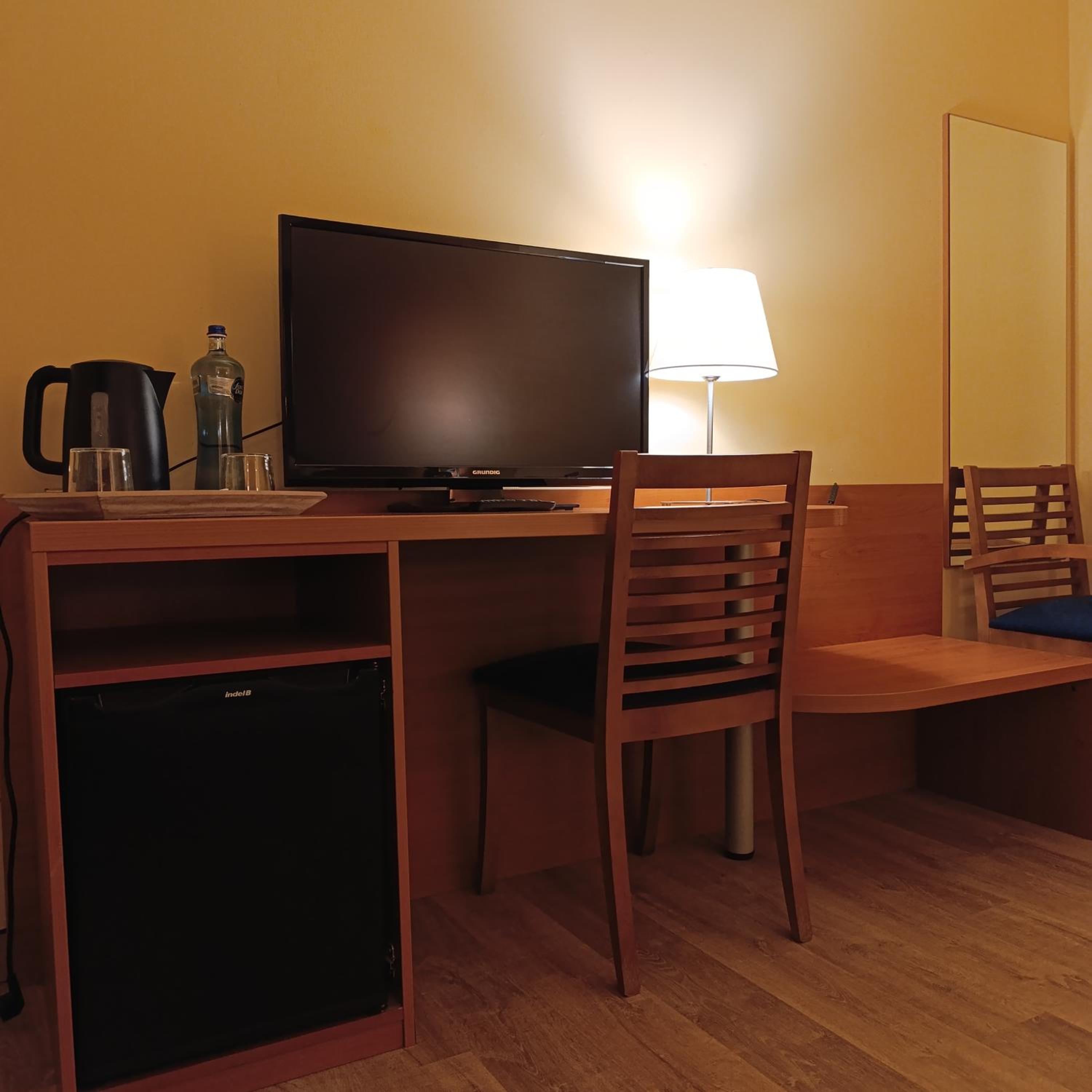 Habitación Doble Superior con Terraza y Vista al Jardín.