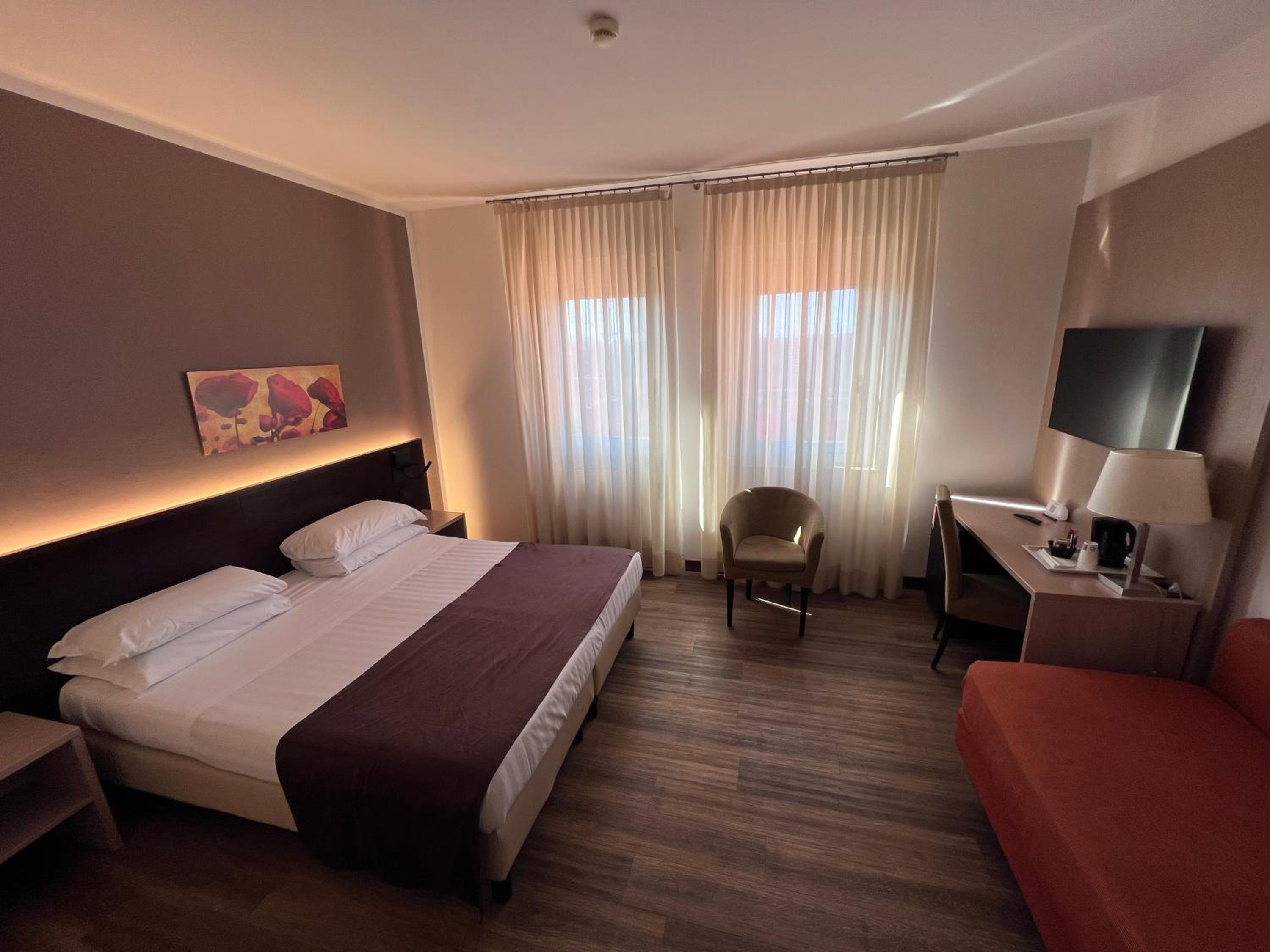 Triple Room - Photo 1
