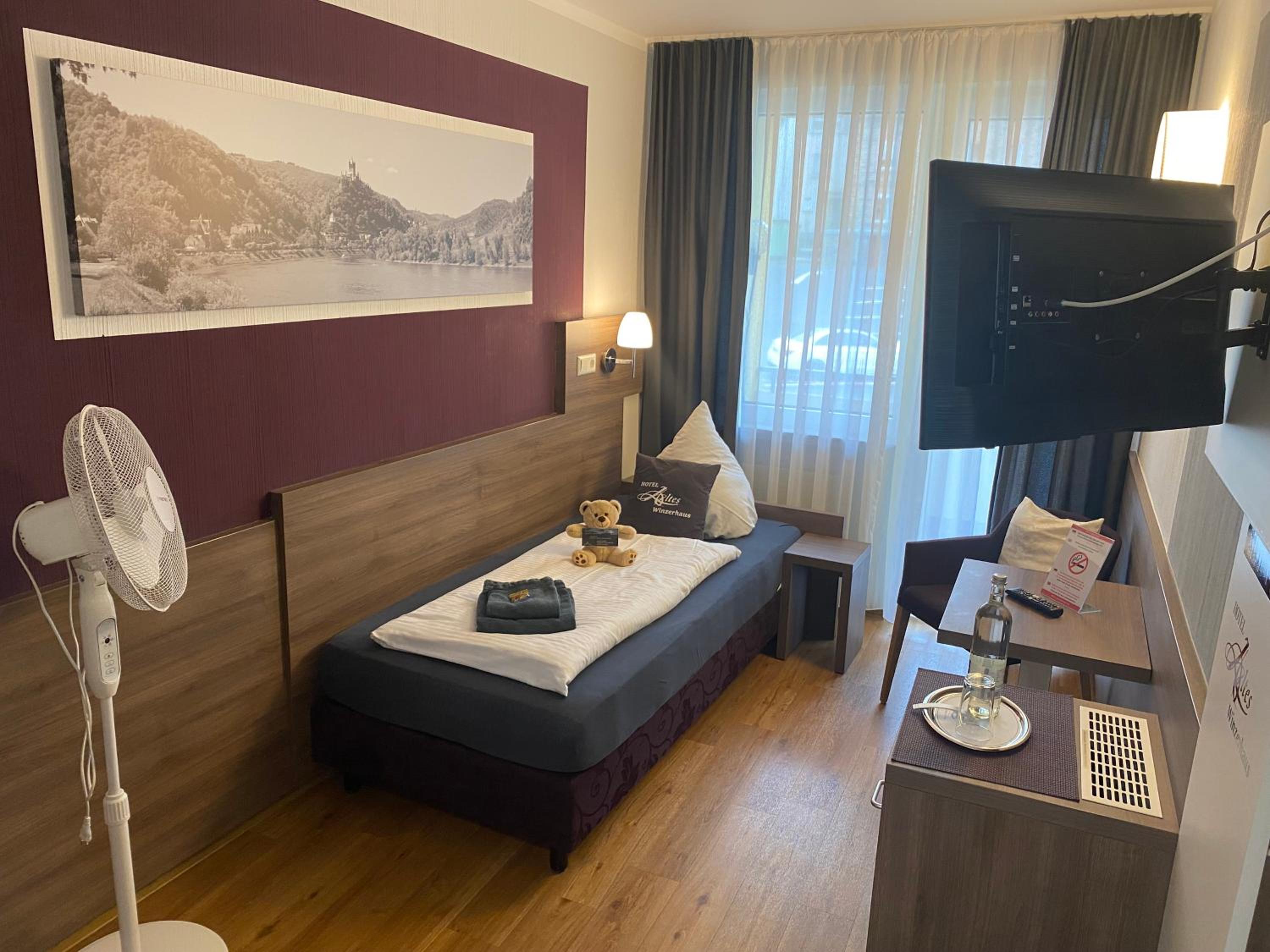 Single Room With Balcony And Residential Area View
