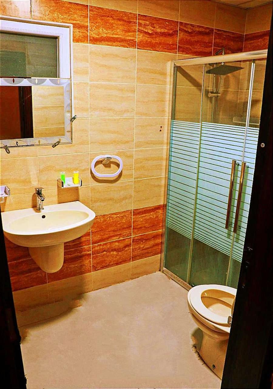 Three-Bedroom Apartment - Photo 2