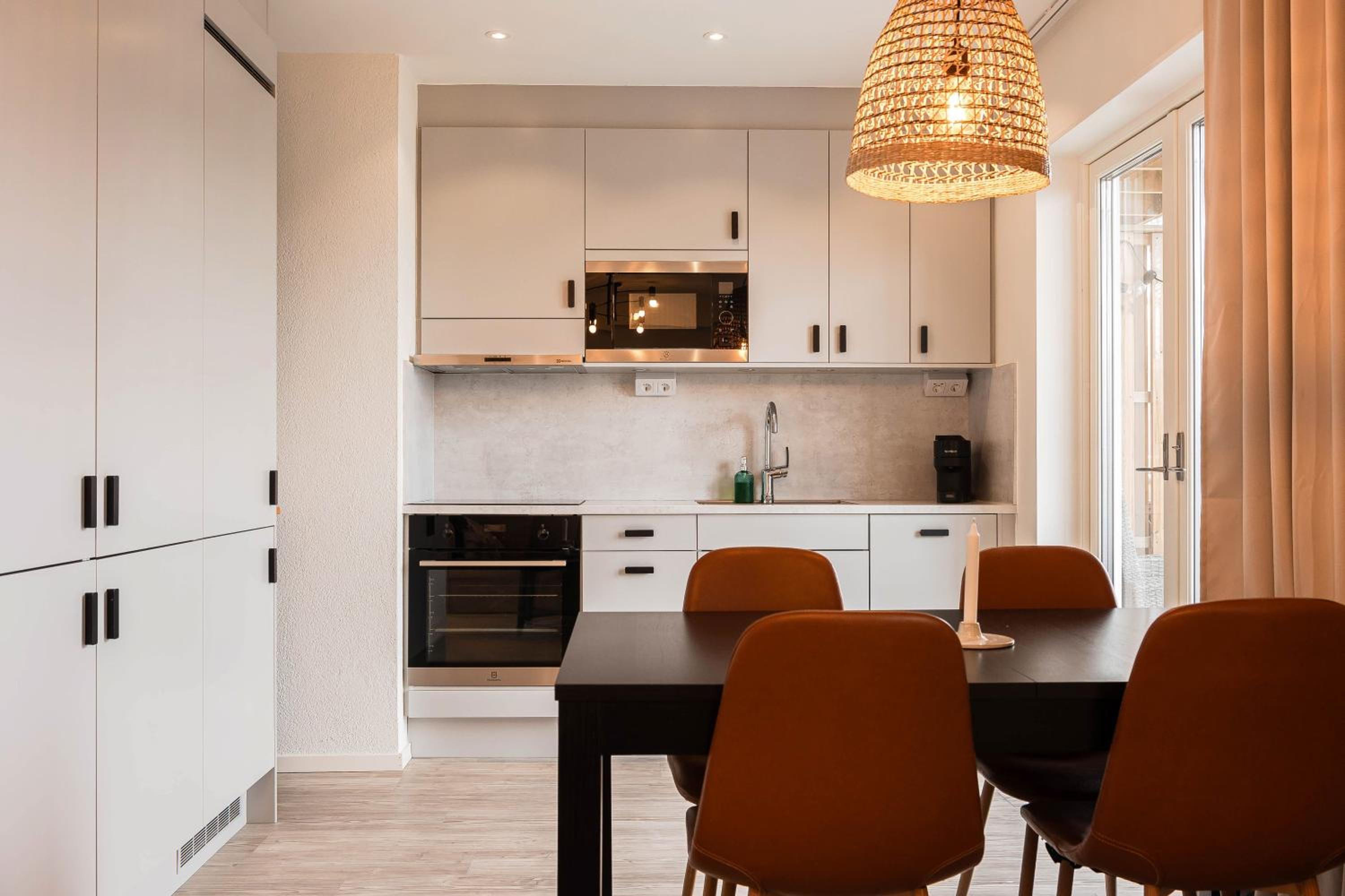 Three-Bedroom Apartment - Photo 32