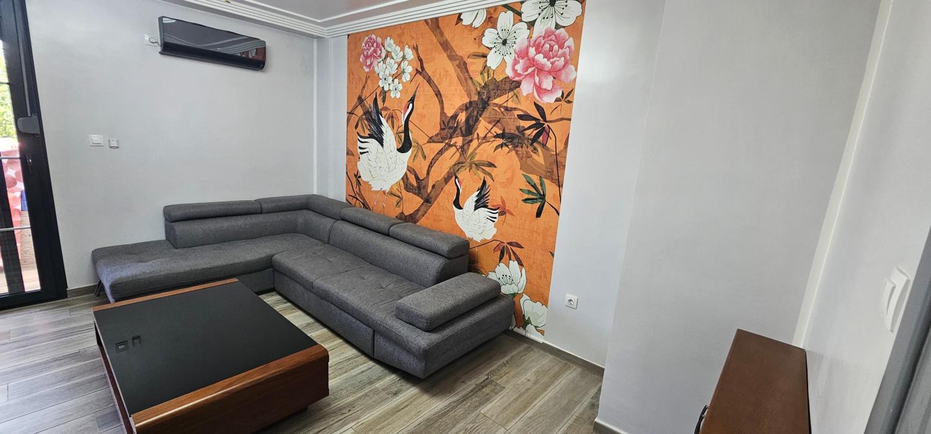 Three-Bedroom Apartment photo 1