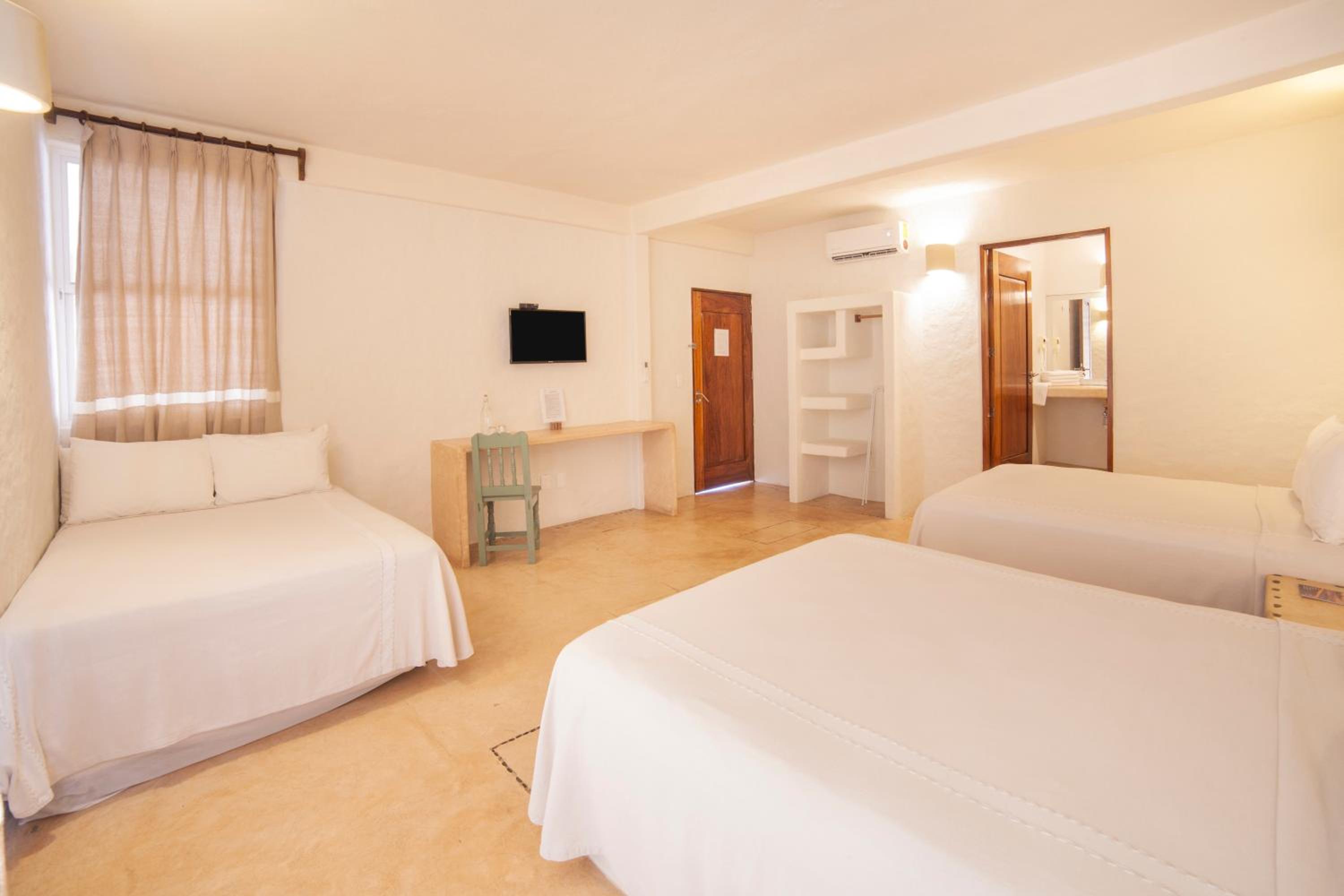 Triple Room - Photo 1