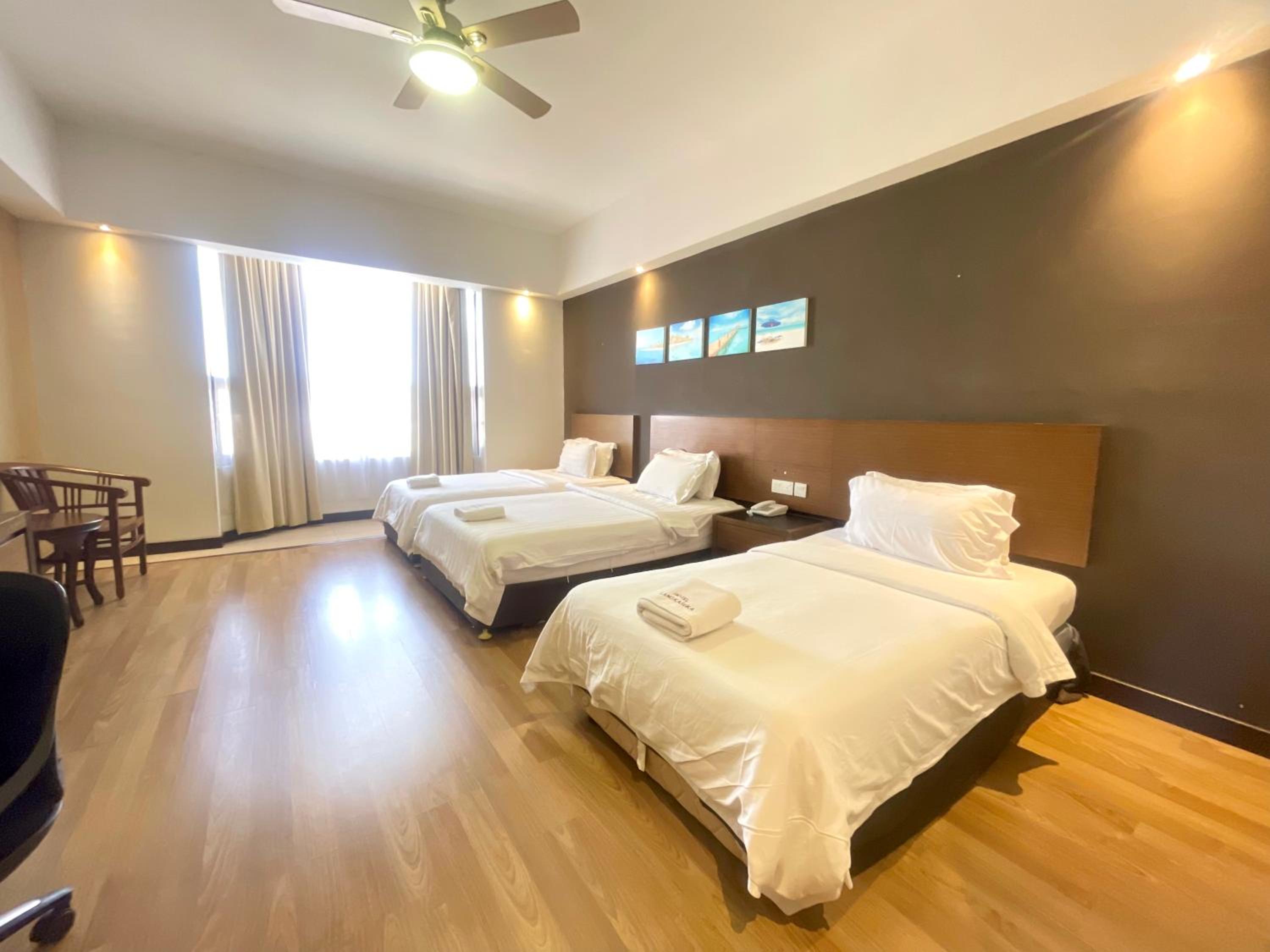 Deluxe Triple Room - Photo 2