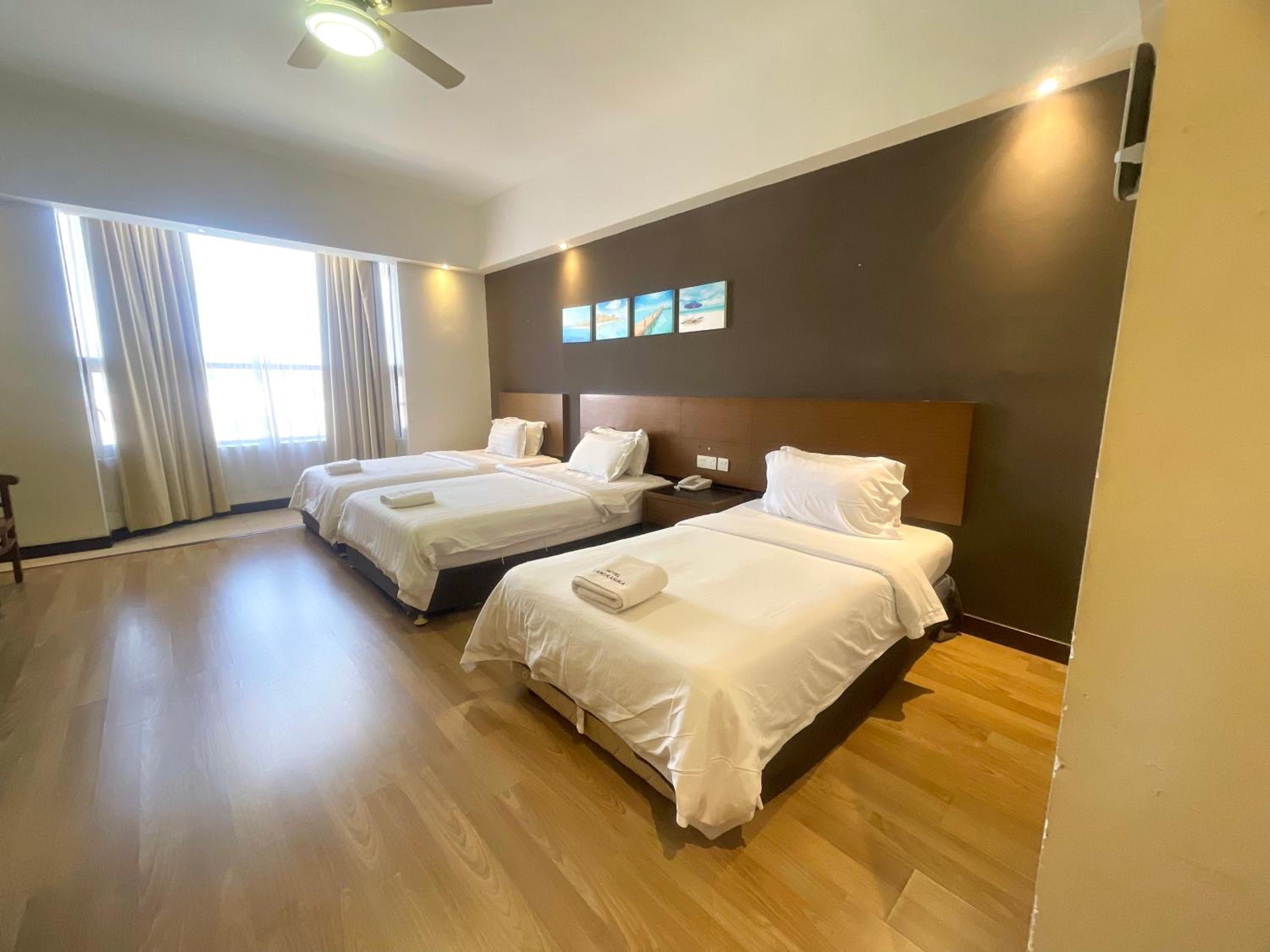 Deluxe Triple Room - Photo 1