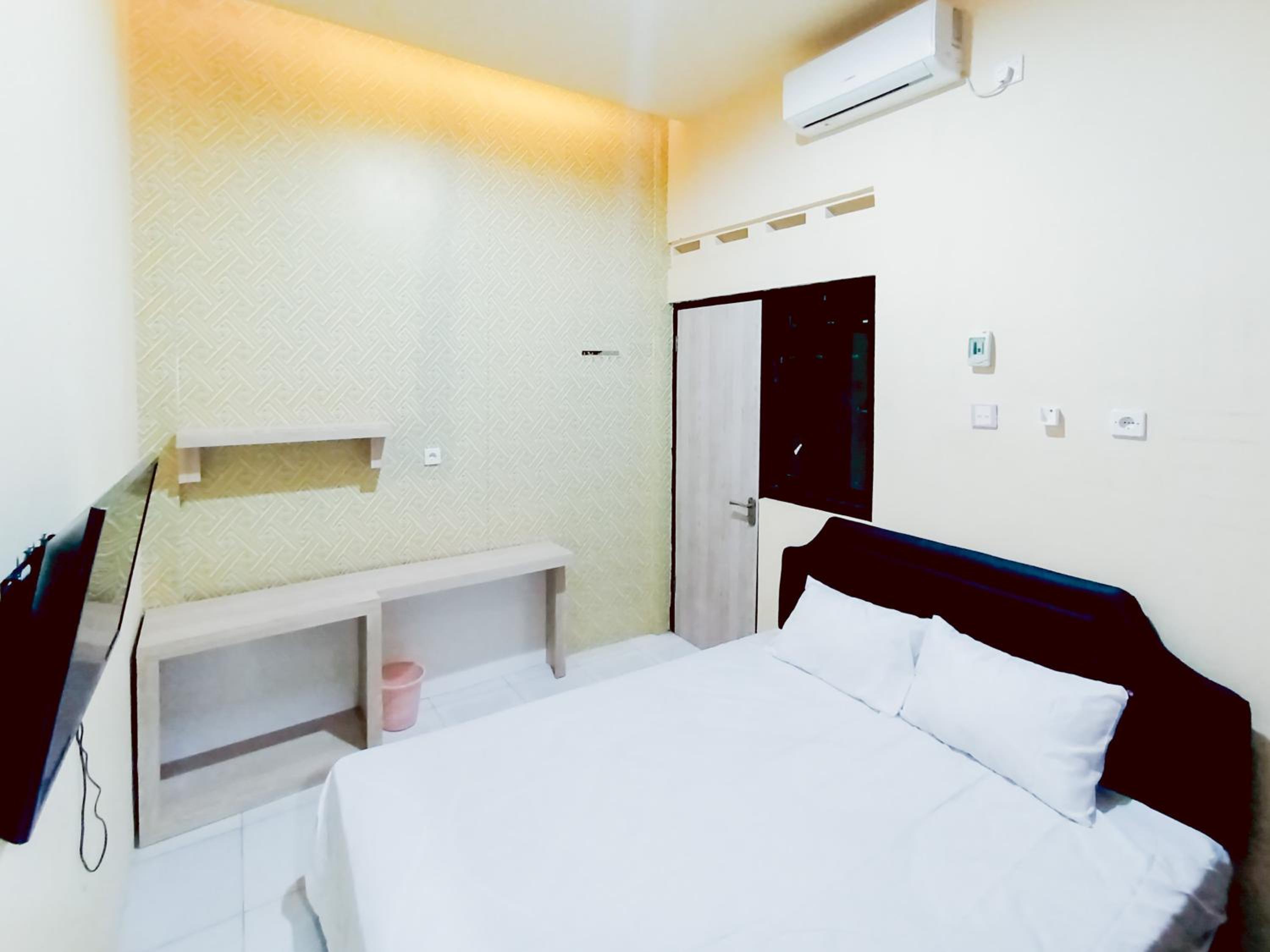 Deluxe Room - Photo 1