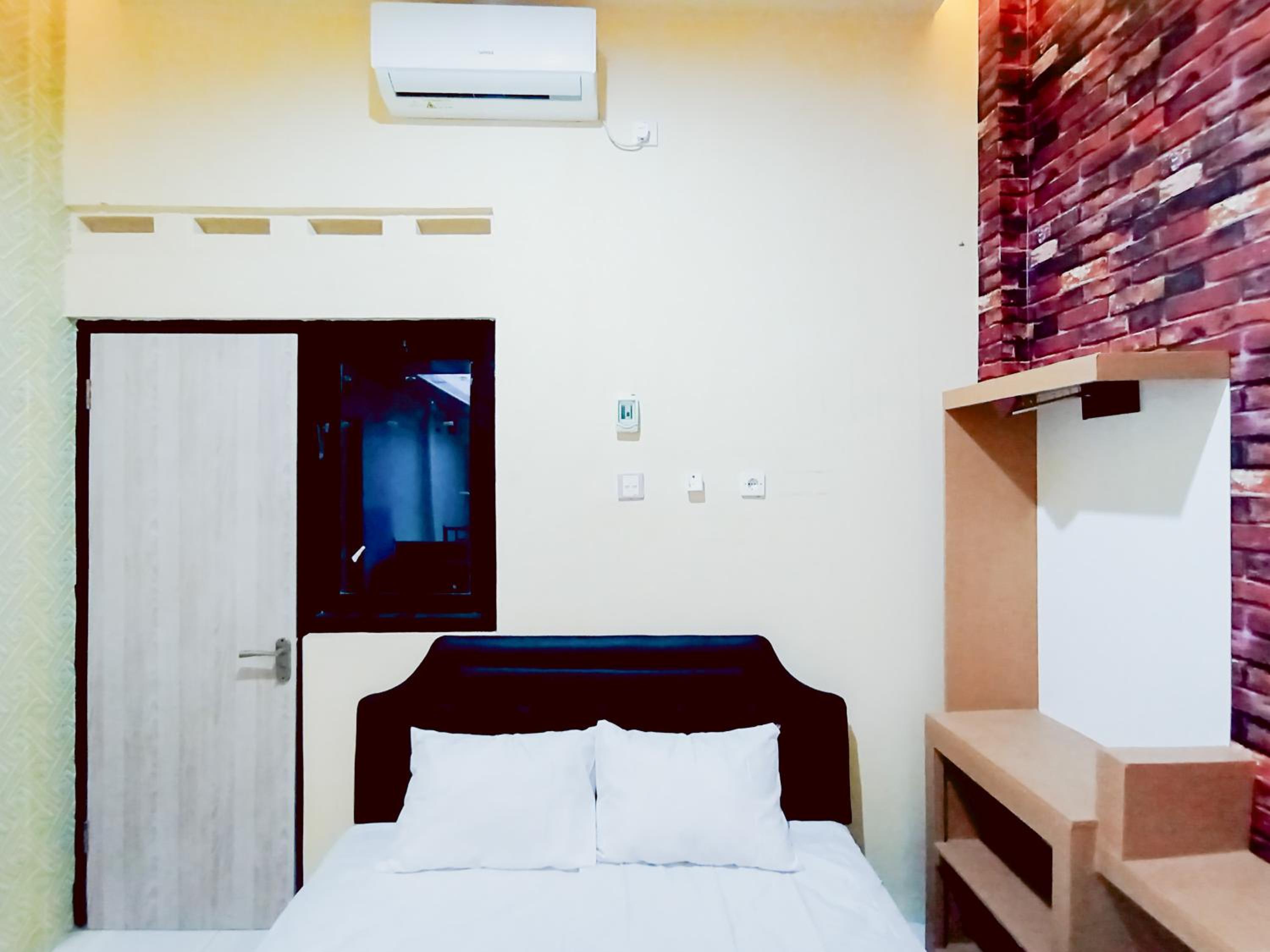 Deluxe Room - Photo 11